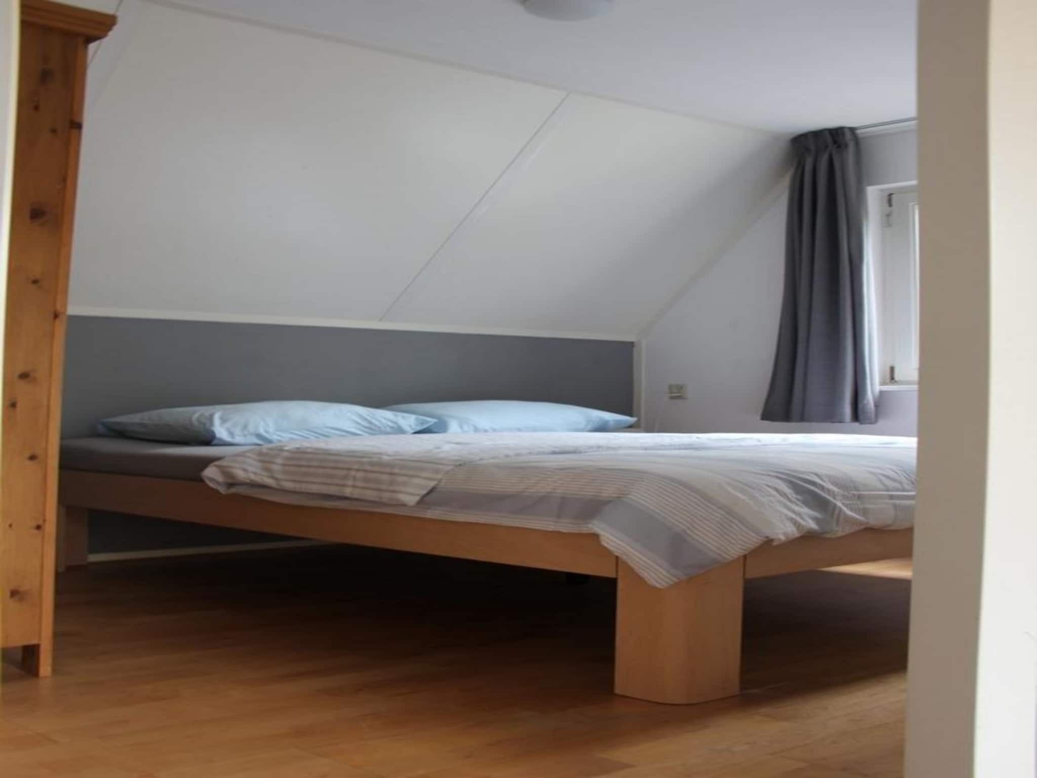 Een slaapkamer van Vogelvrij 5 in Burgerbrug