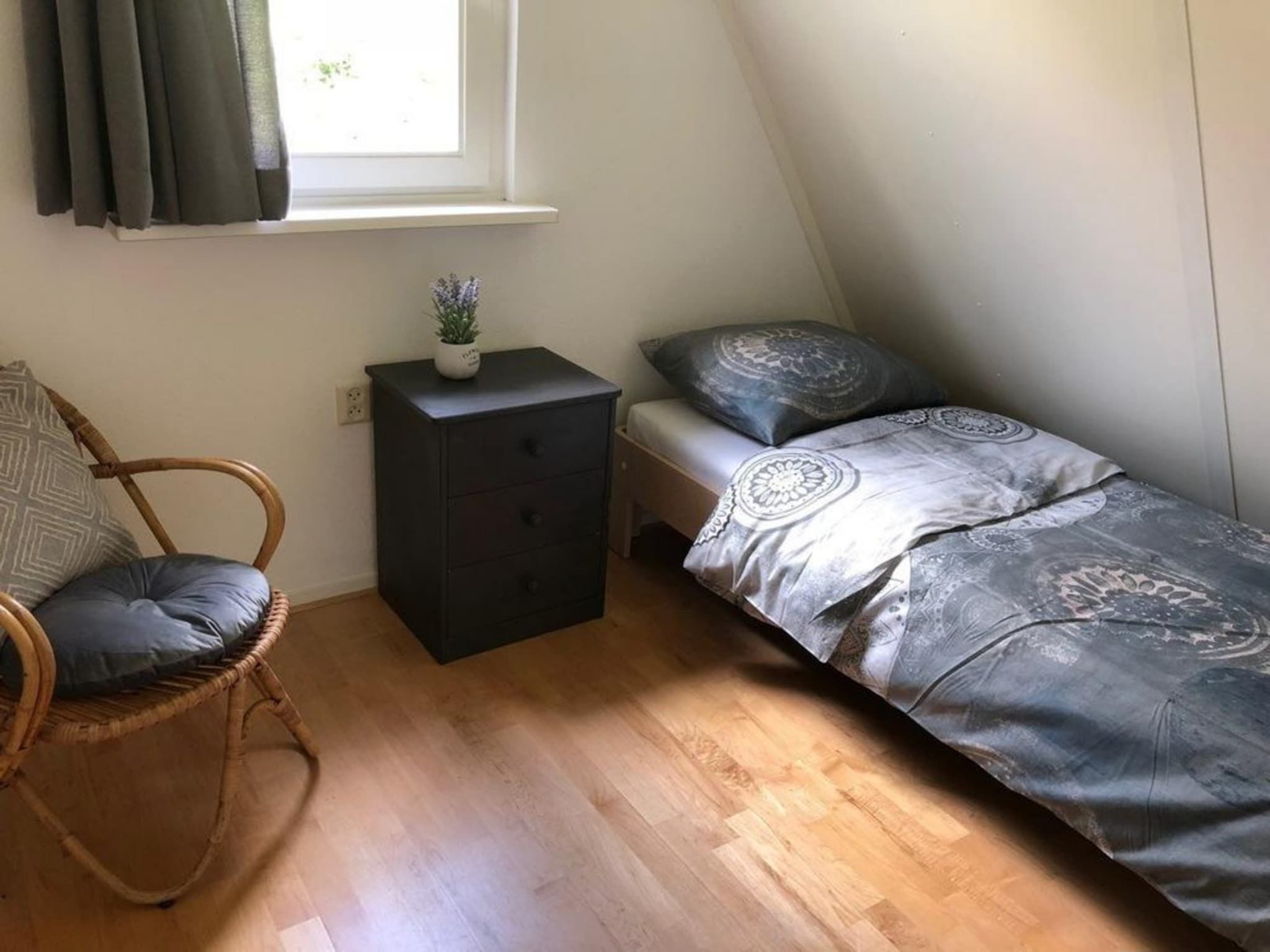 Een slaapkamer van Vogelvrij 5 in Burgerbrug