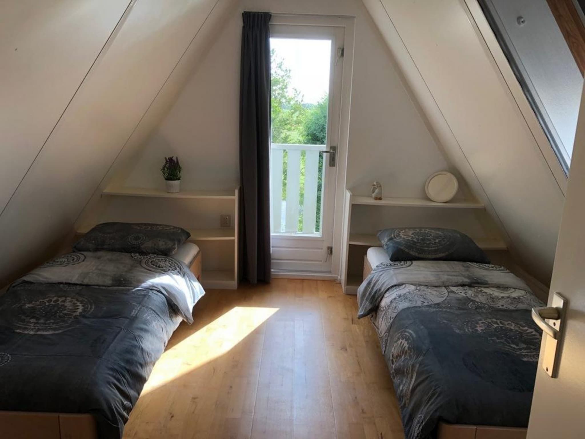 Een slaapkamer van Vogelvrij 5 in Burgerbrug