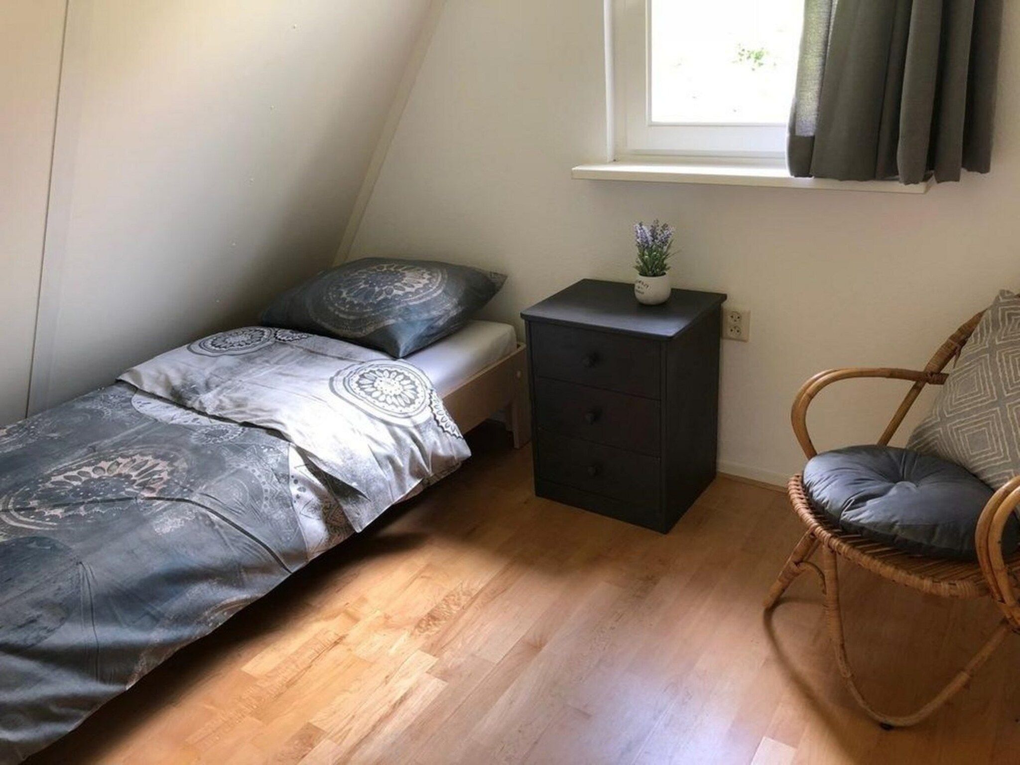 Een slaapkamer van Vogelvrij 5 in Burgerbrug