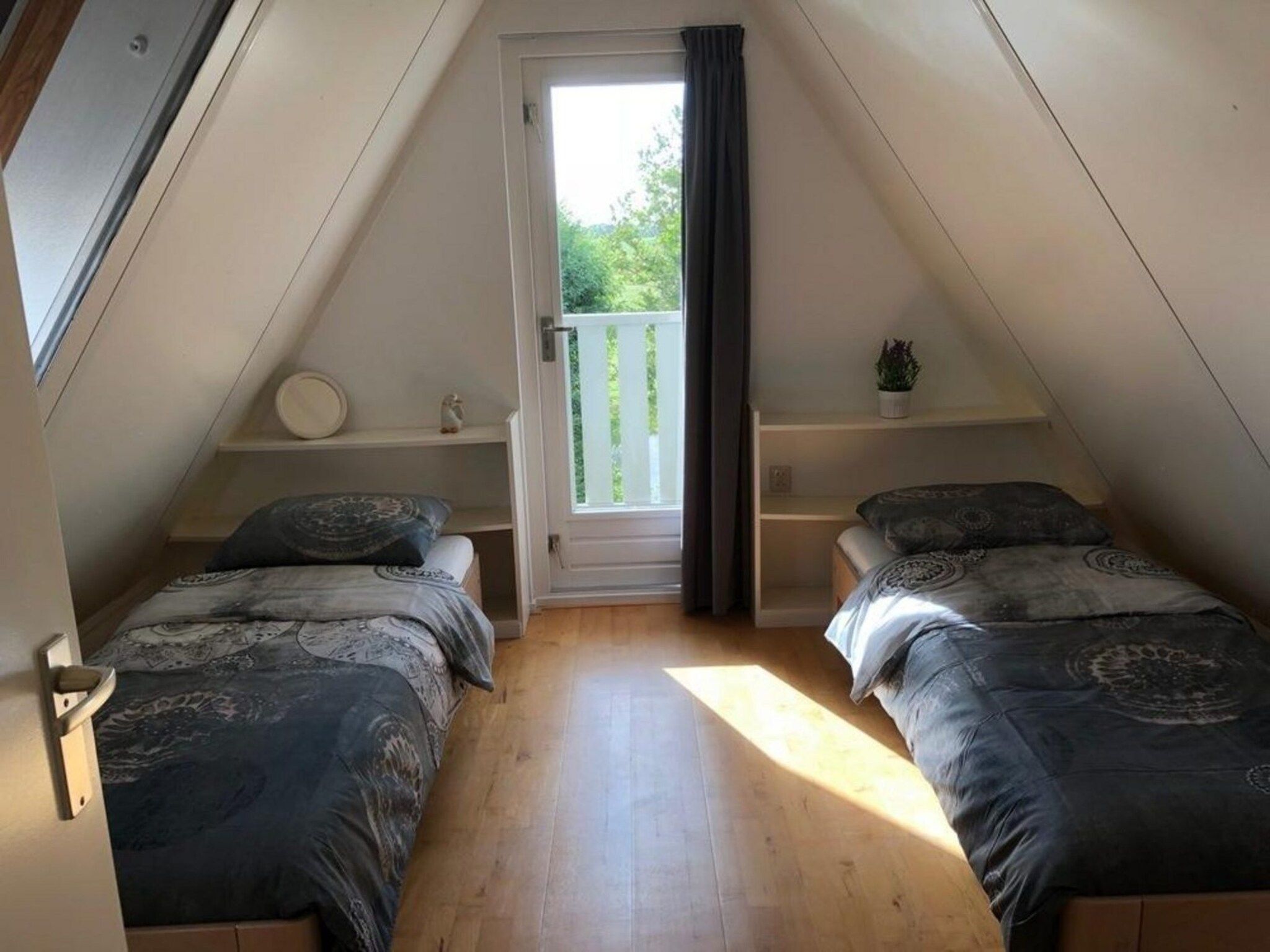 Een slaapkamer van Vogelvrij 5 in Burgerbrug