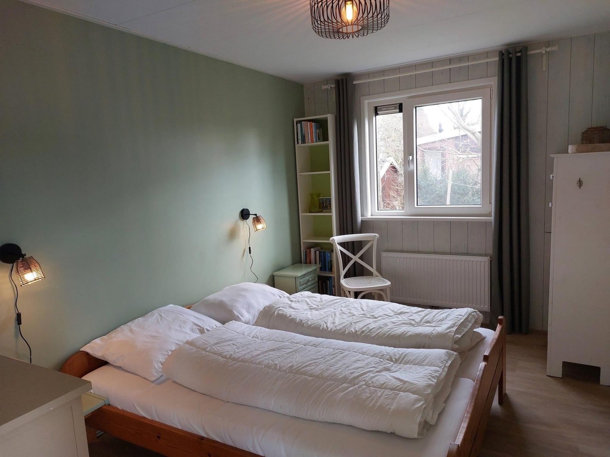 Een slaapkamer van Eureka 102 in Sint Maartensvlotbrug