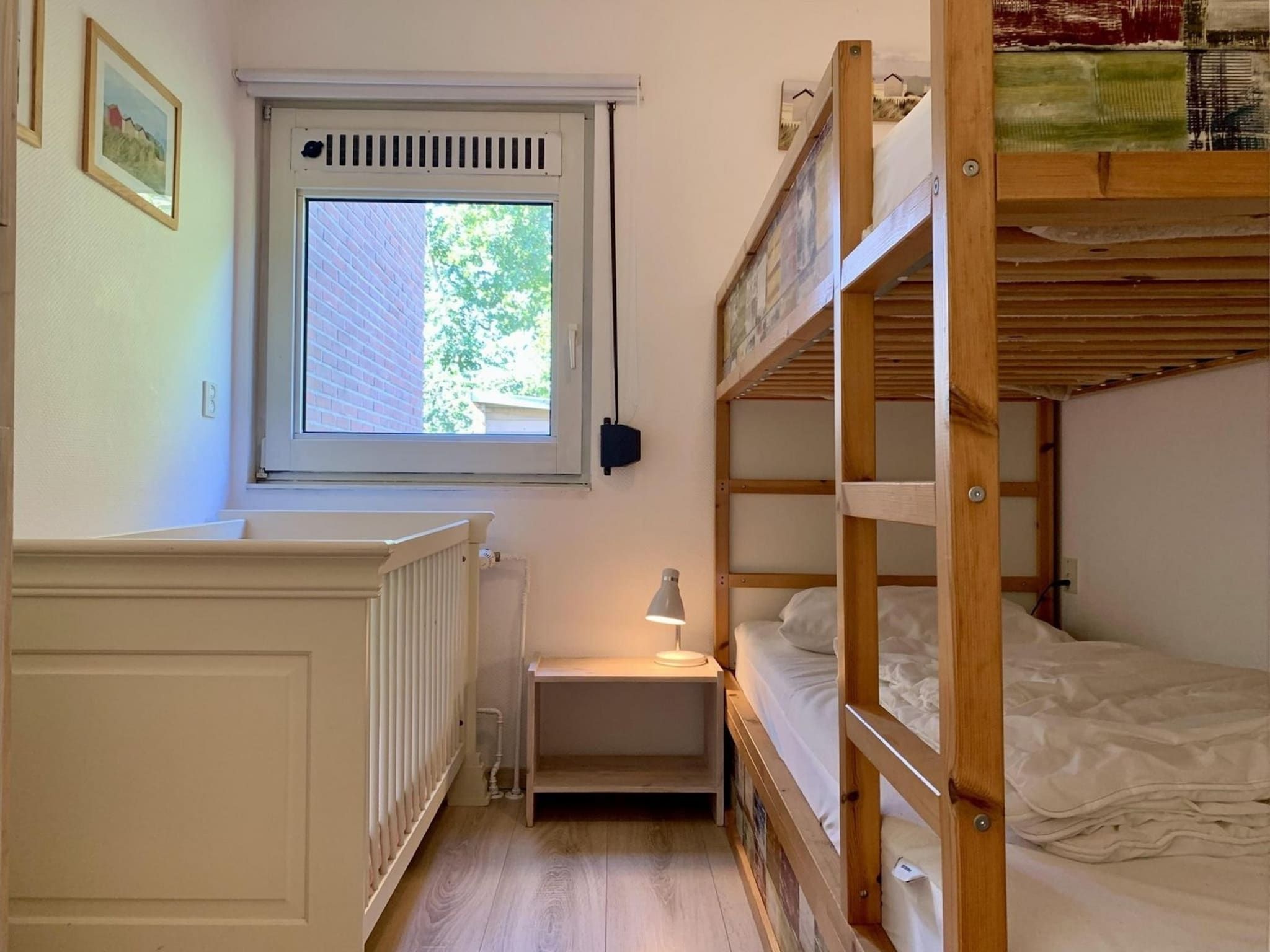 Een slaapkamer van Eureka 061 in Sint Maartenszee