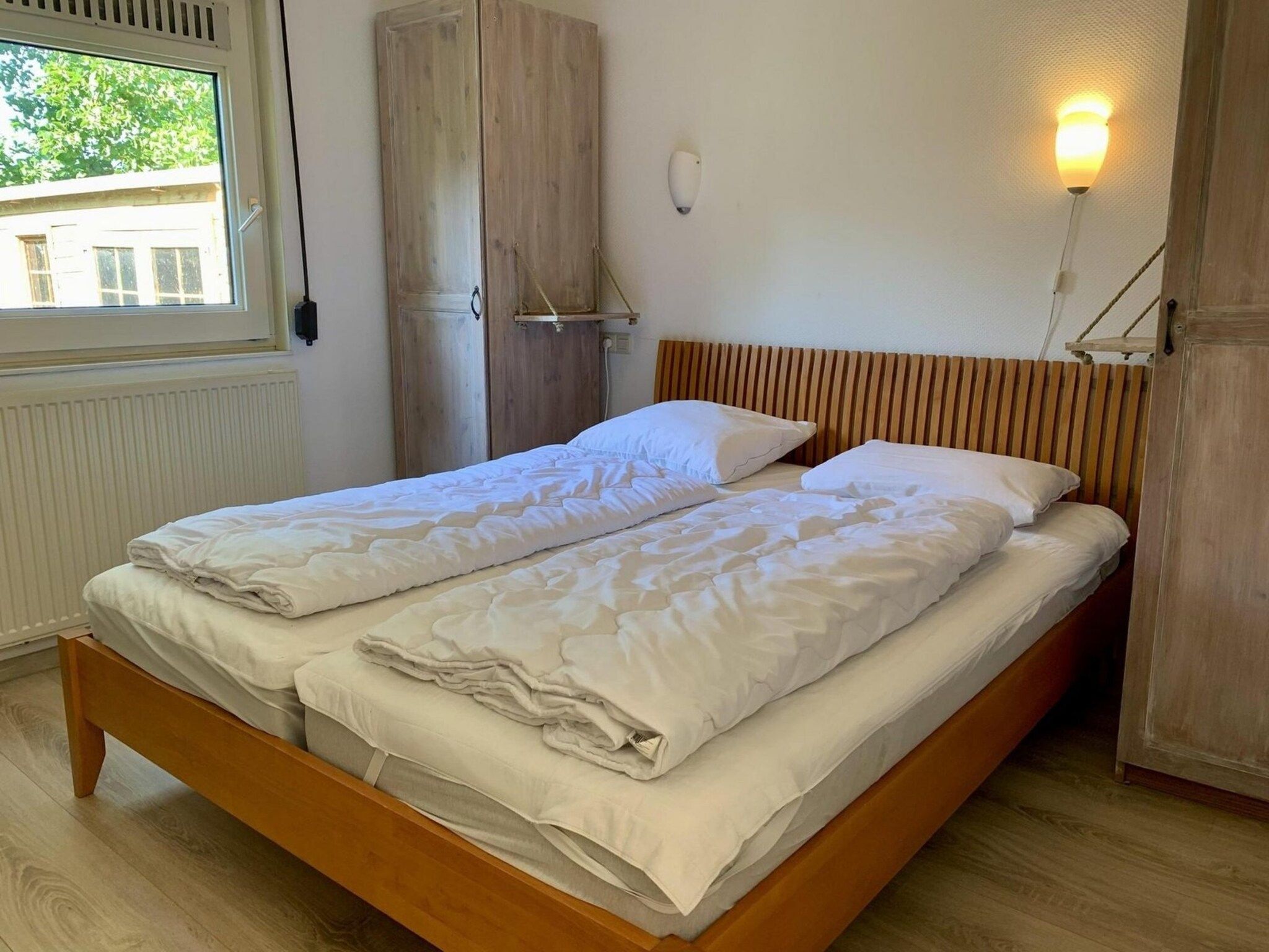 Een slaapkamer van Eureka 061 in Sint Maartenszee