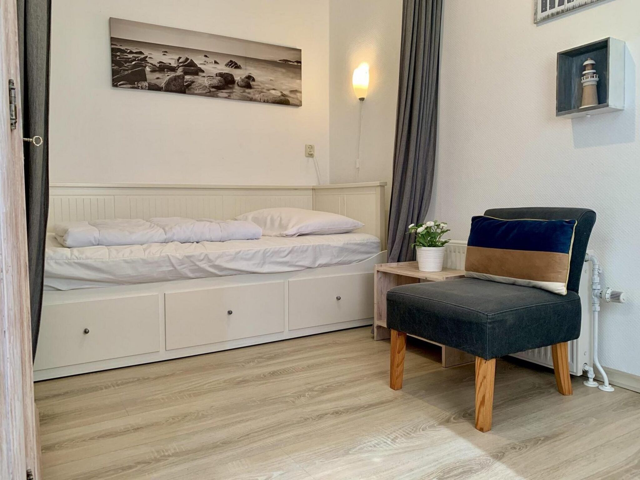 Een slaapkamer van Eureka 061 in Sint Maartenszee