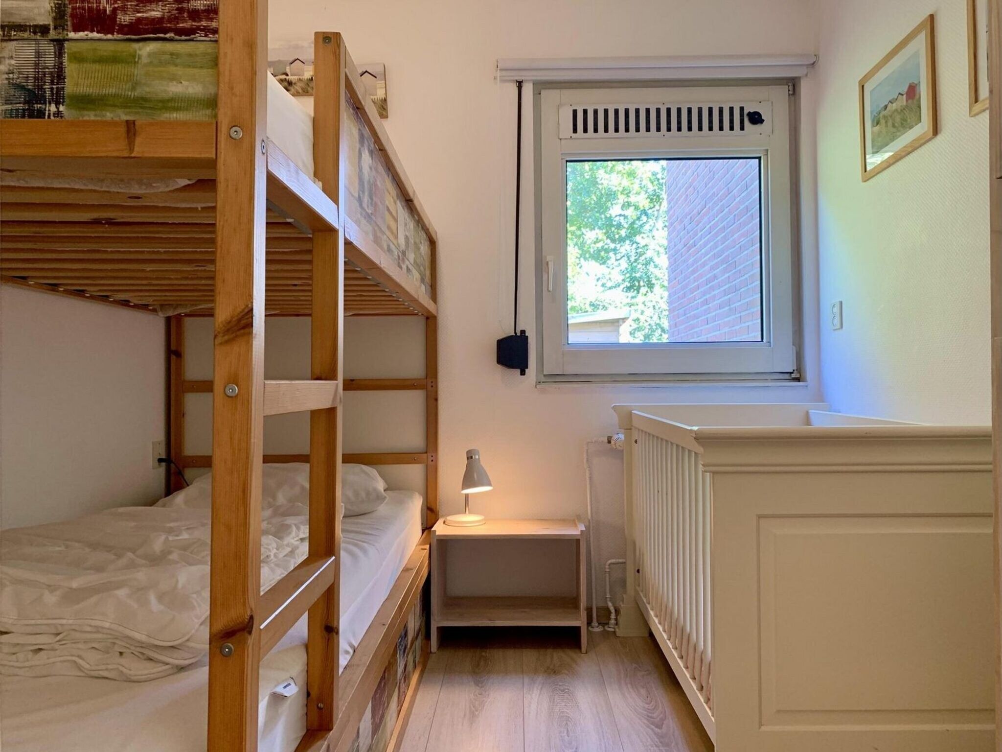 Een slaapkamer van Eureka 061 in Sint Maartenszee