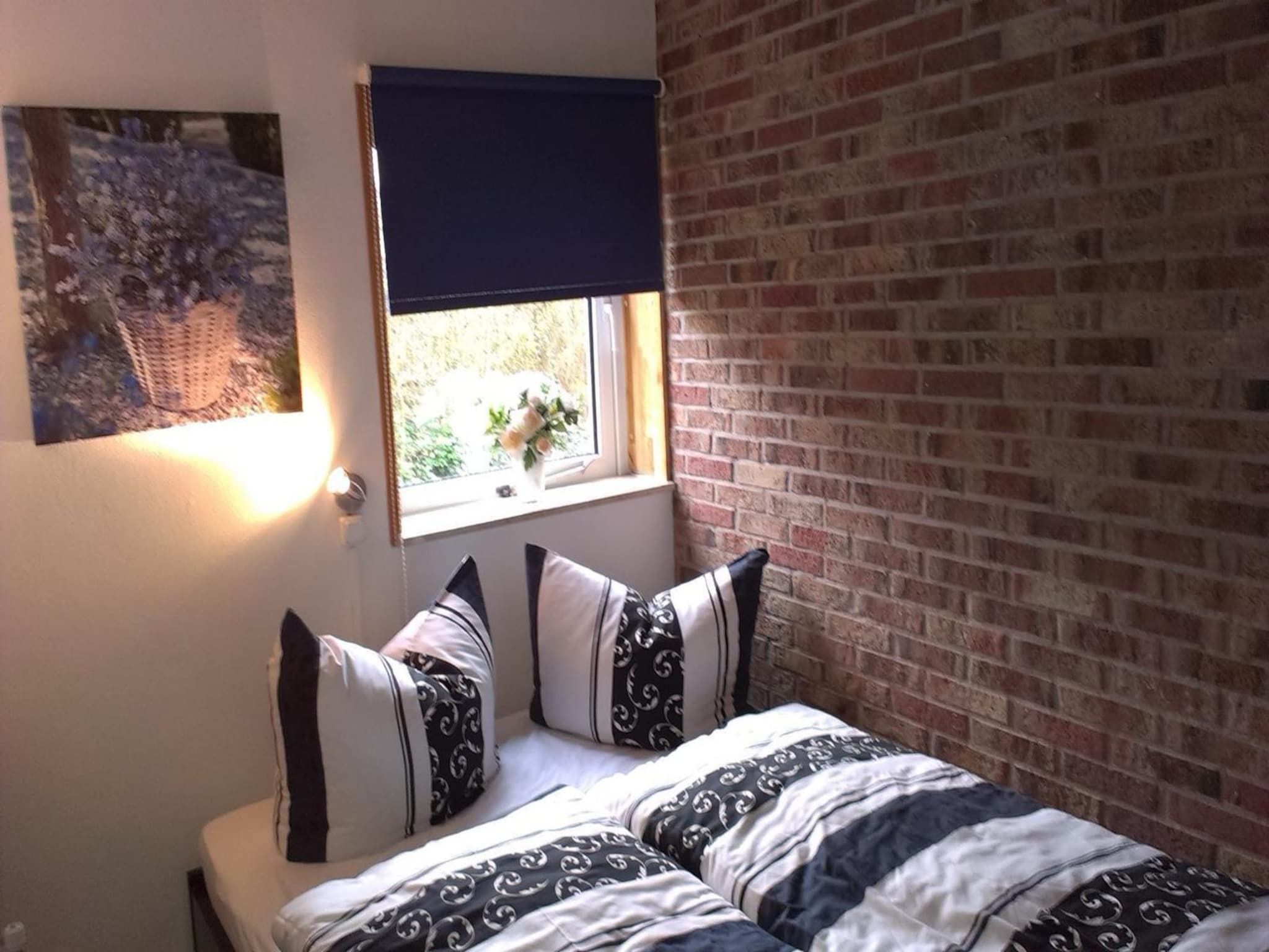 Een slaapkamer van Zeewaard 20 in Sint Maartenszee