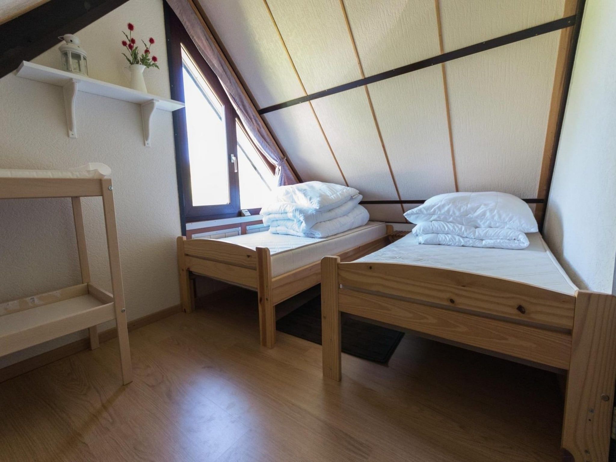 Een slaapkamer van Belkmerduinen 01 in Sint Maartenszee