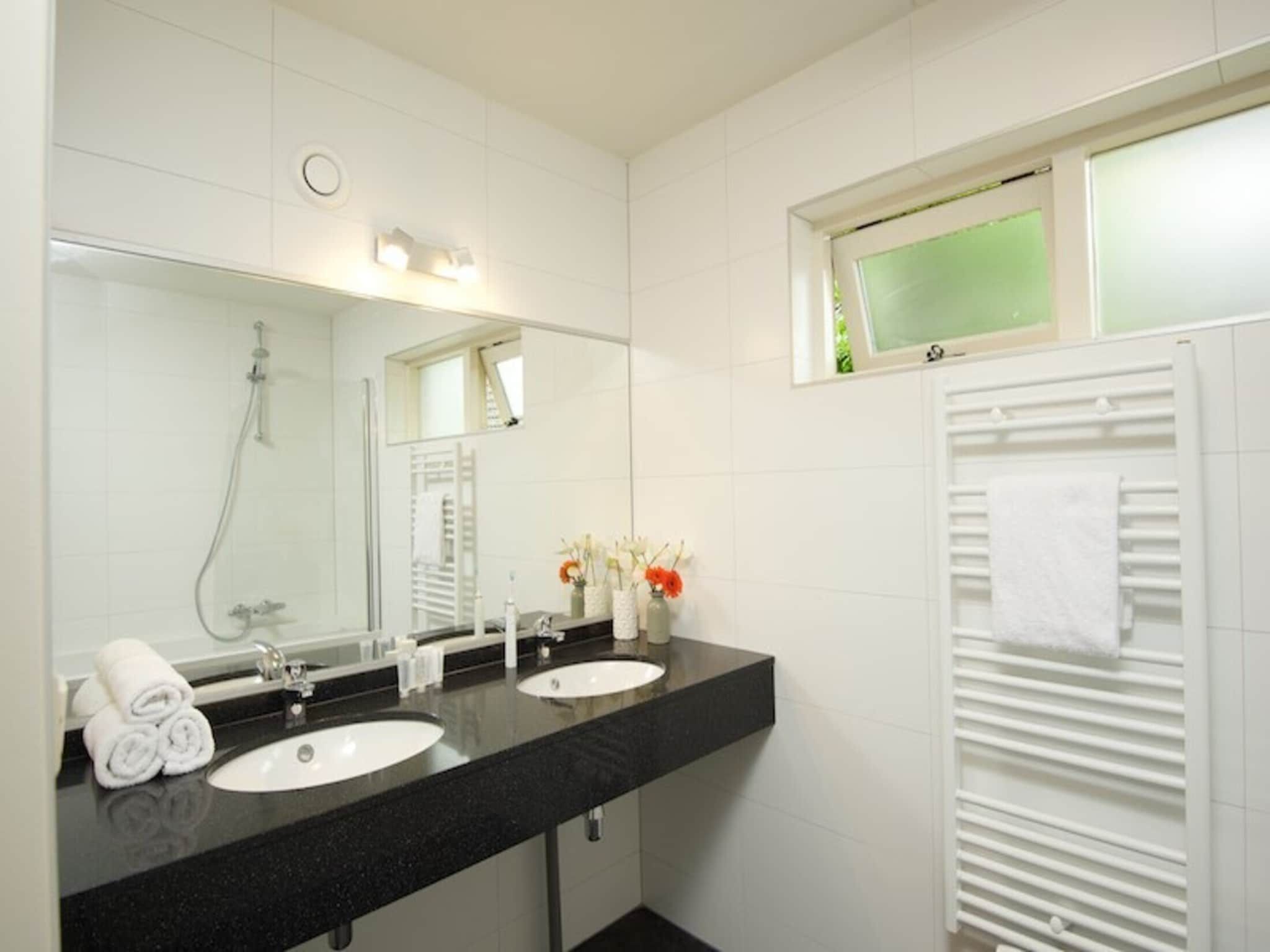 Een slaapkamer van Holiday home 6 persons in Scherpenzeel