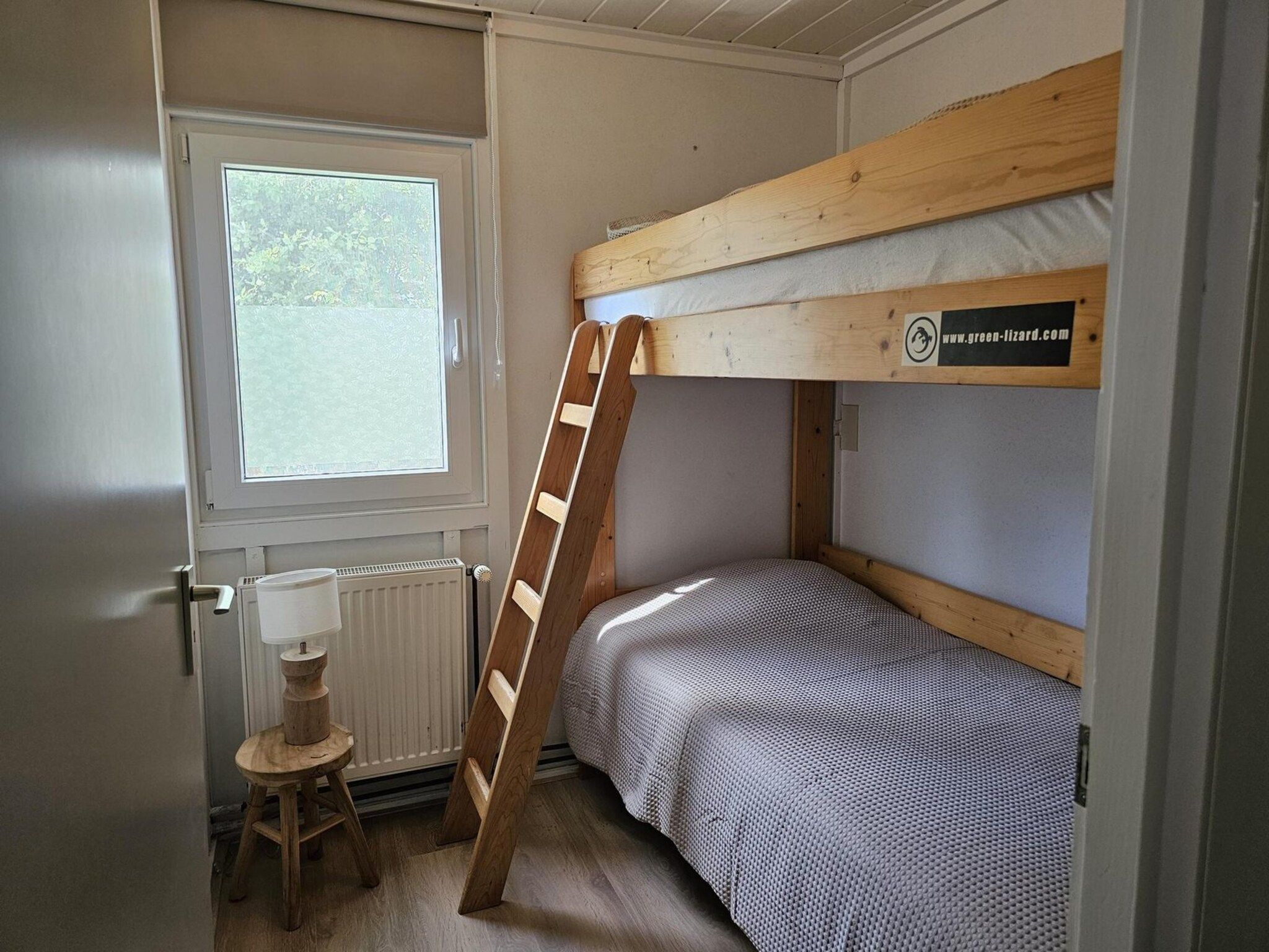 Een slaapkamer van Eb en Vloed 62 in Sint Maartenszee
