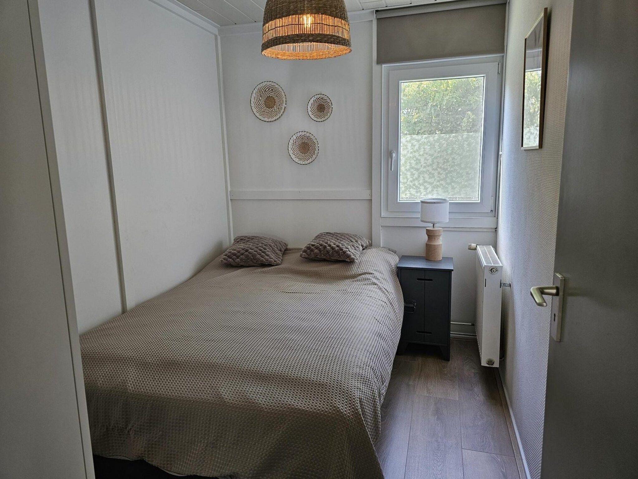 Een slaapkamer van Eb en Vloed 62 in Sint Maartenszee