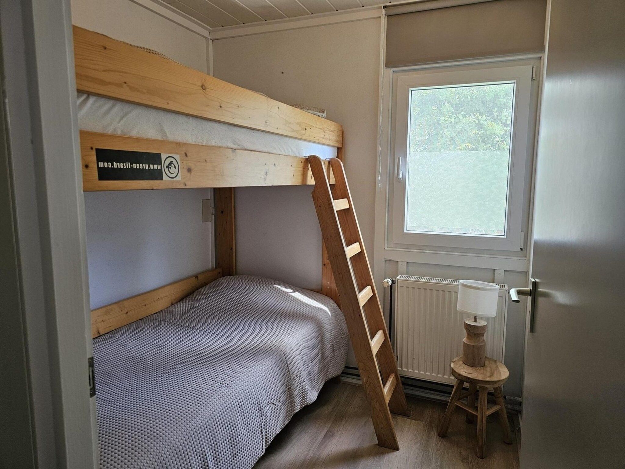 Een slaapkamer van Eb en Vloed 62 in Sint Maartenszee