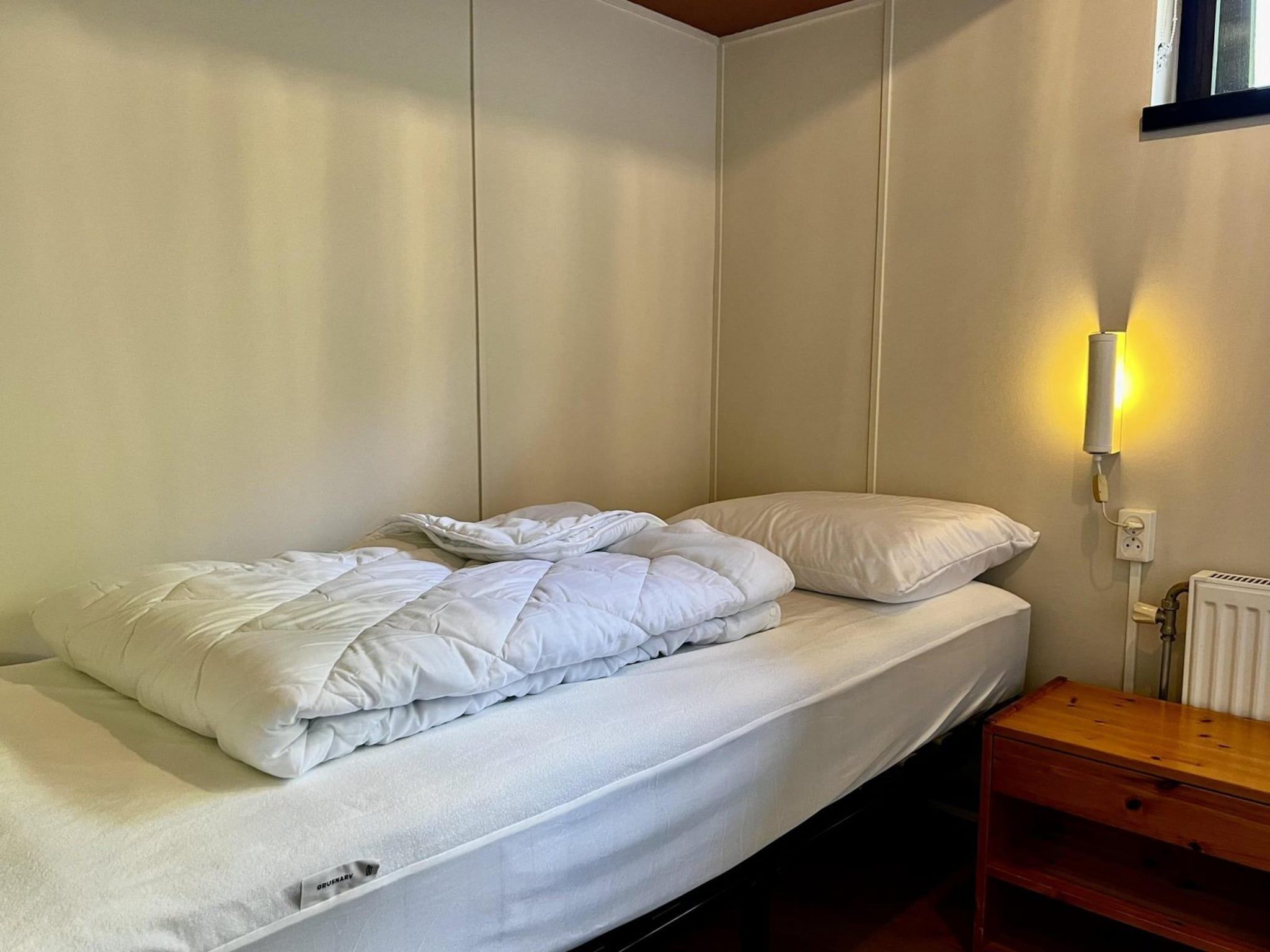 Een slaapkamer van Wildrijk 092 -"C'est la vie" in Sint Maartenszee