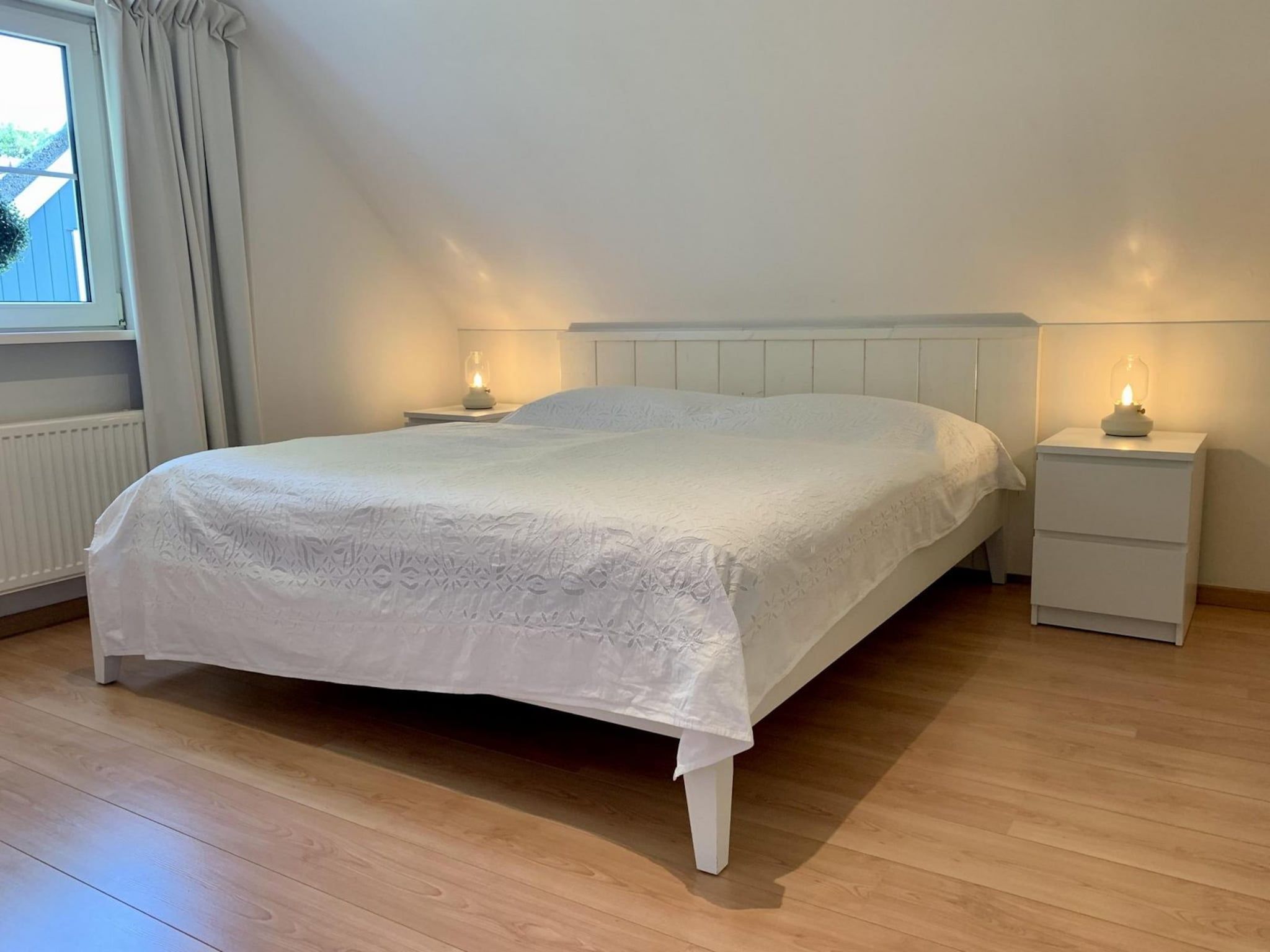 Een slaapkamer van Anzelhoef 7 in Sint Maartenszee