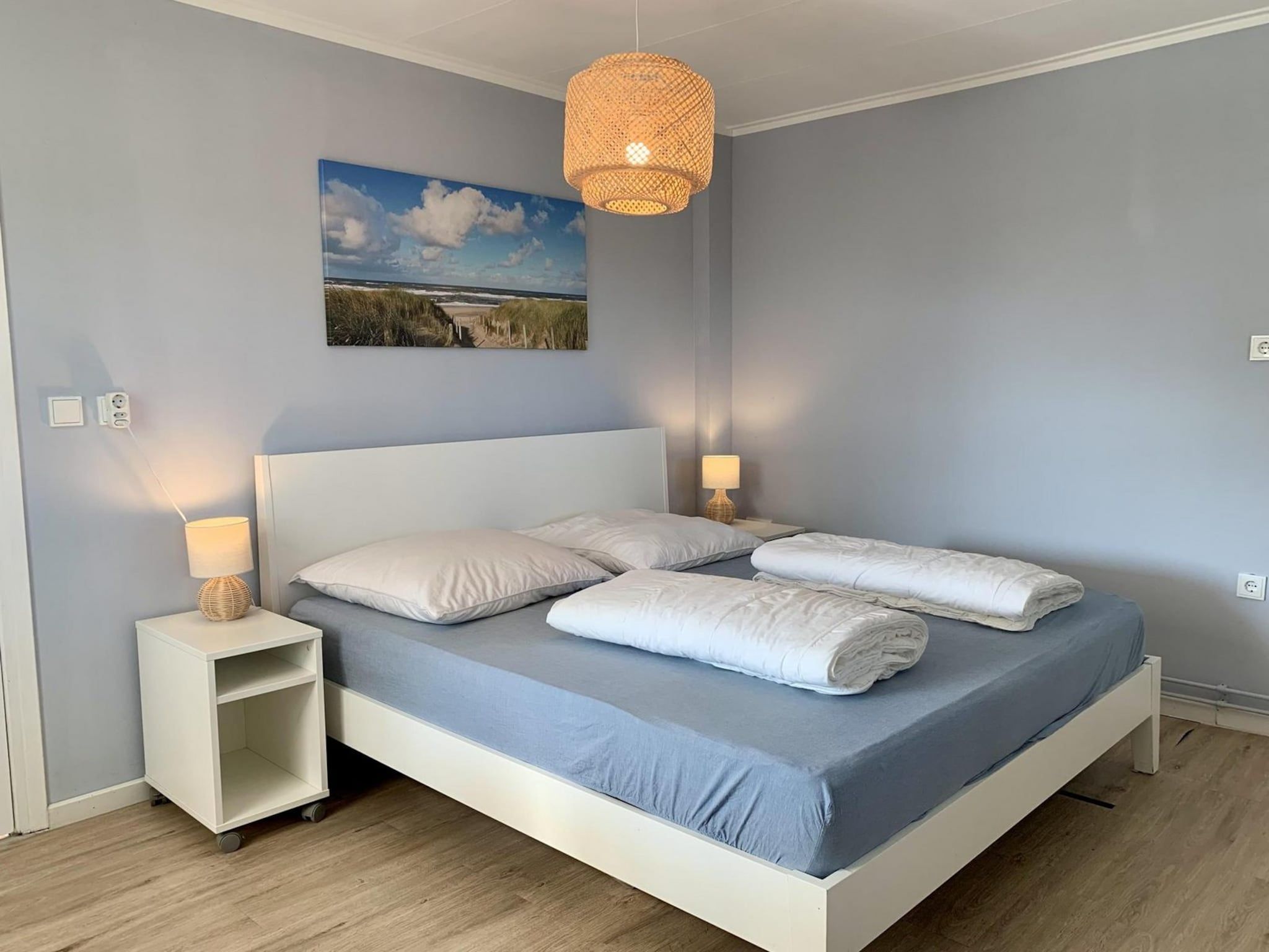 Een slaapkamer van Eureka 075 in Sint Maartenszee