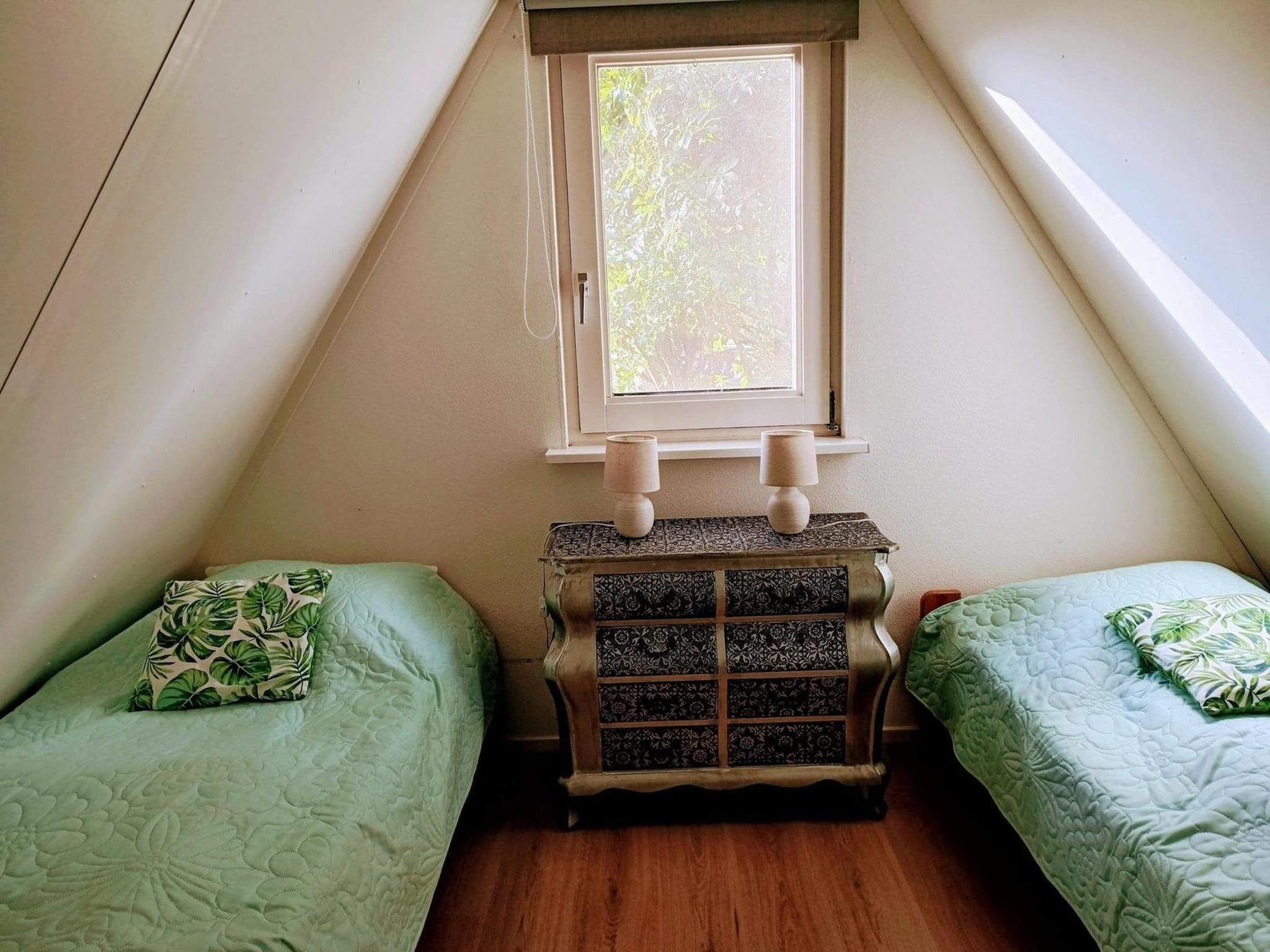 Een slaapkamer van Vogelvrij 3 in Sint Maartenszee