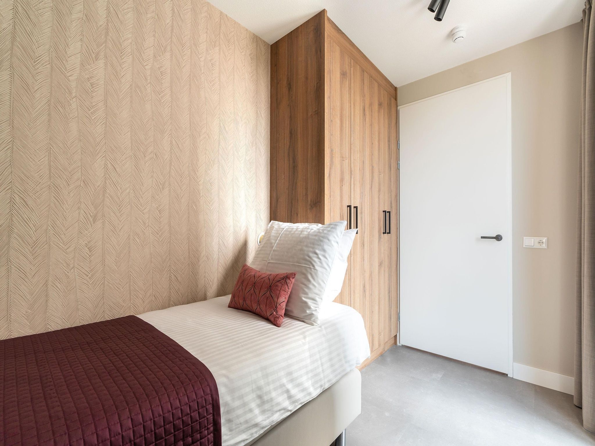 Een slaapkamer van Walden 4 in Den  Haag