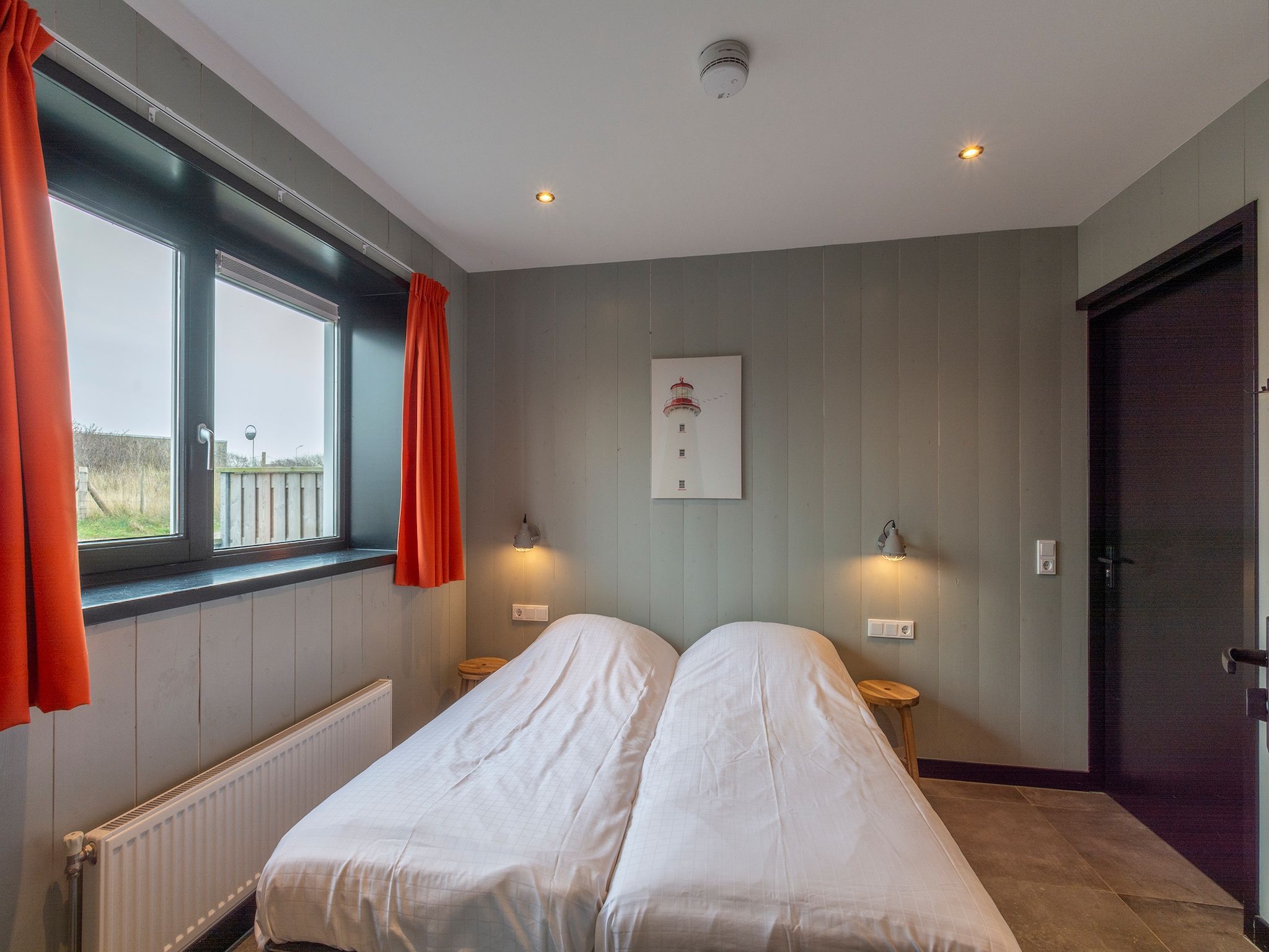 Een slaapkamer van Groote Kaap in Callantsoog