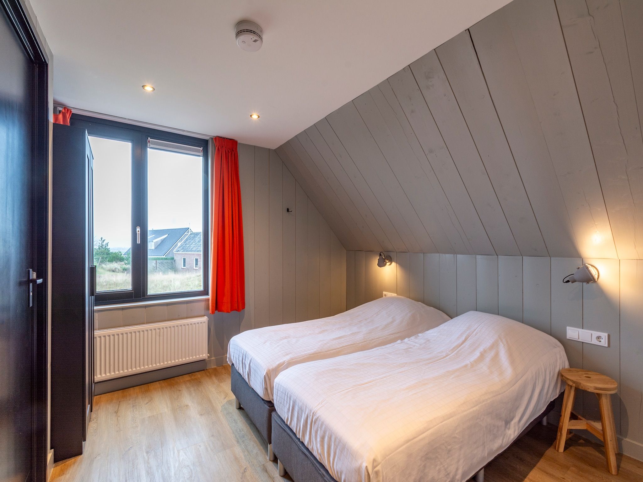 Een slaapkamer van Groote Kaap in Callantsoog