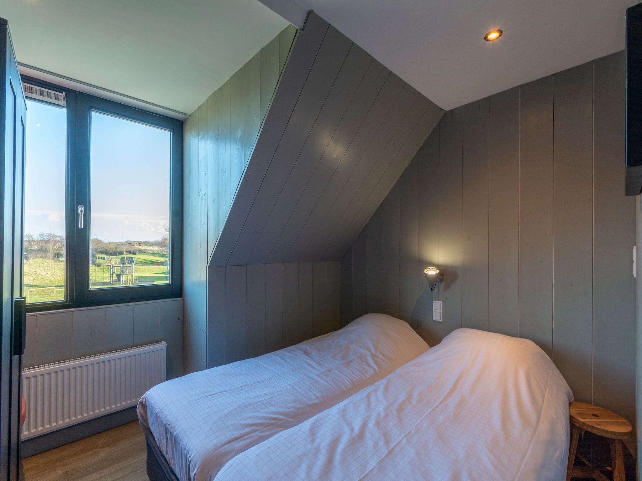 Een slaapkamer van Groote Kaap in Callantsoog