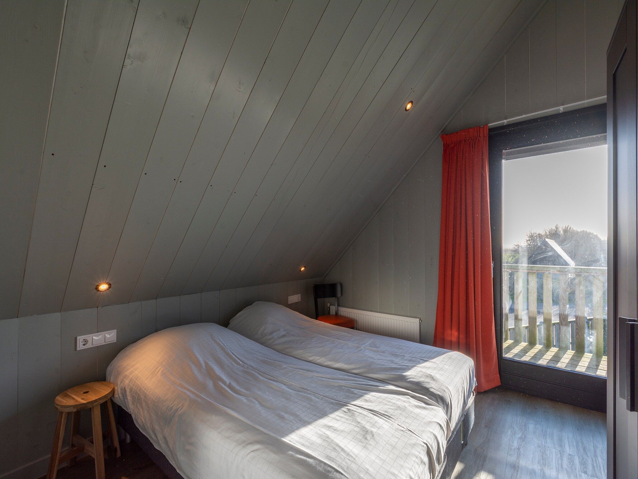 Een slaapkamer van Groote Kaap in Callantsoog