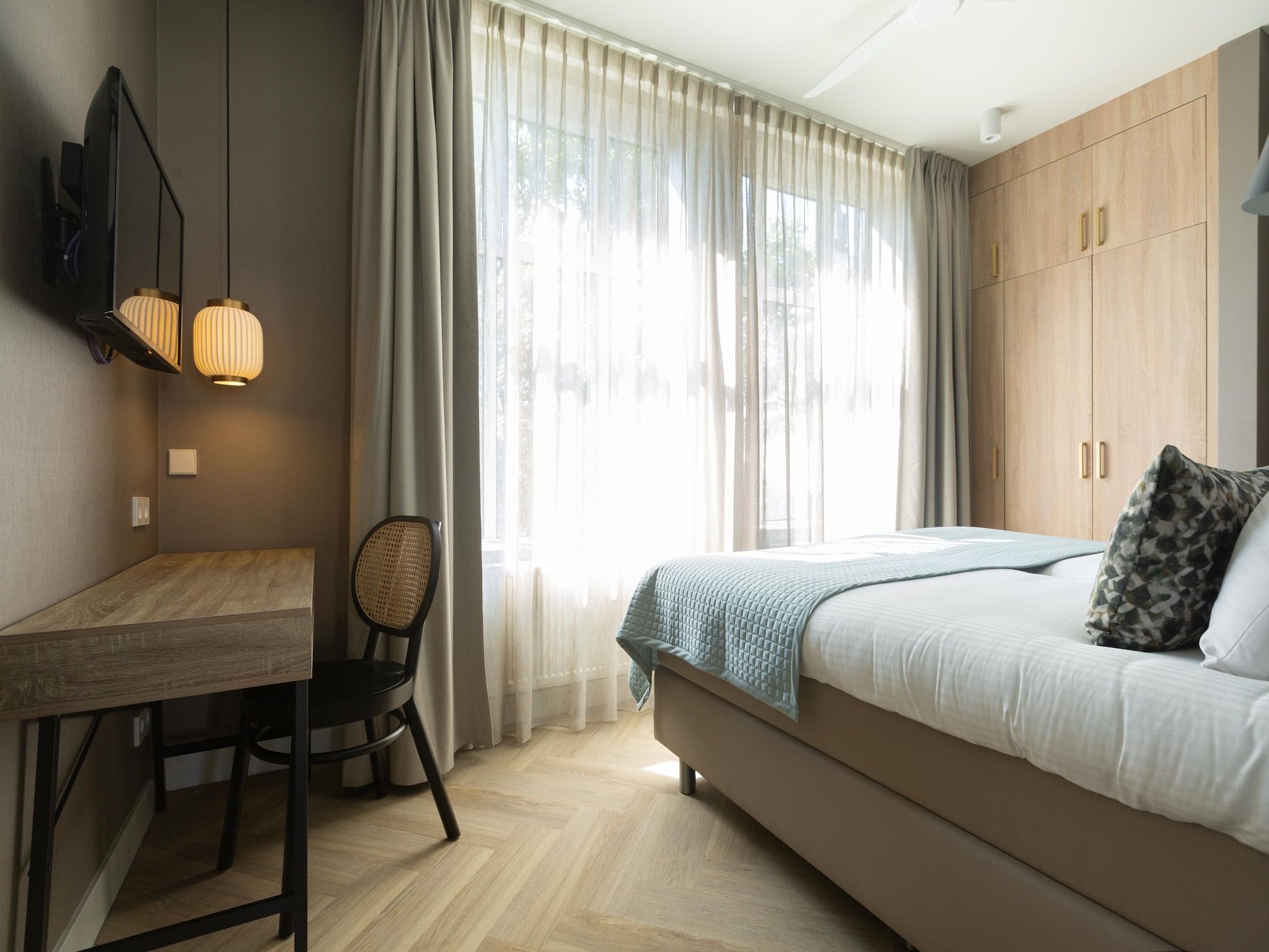 Een slaapkamer van Maurits 4 in Den Haag