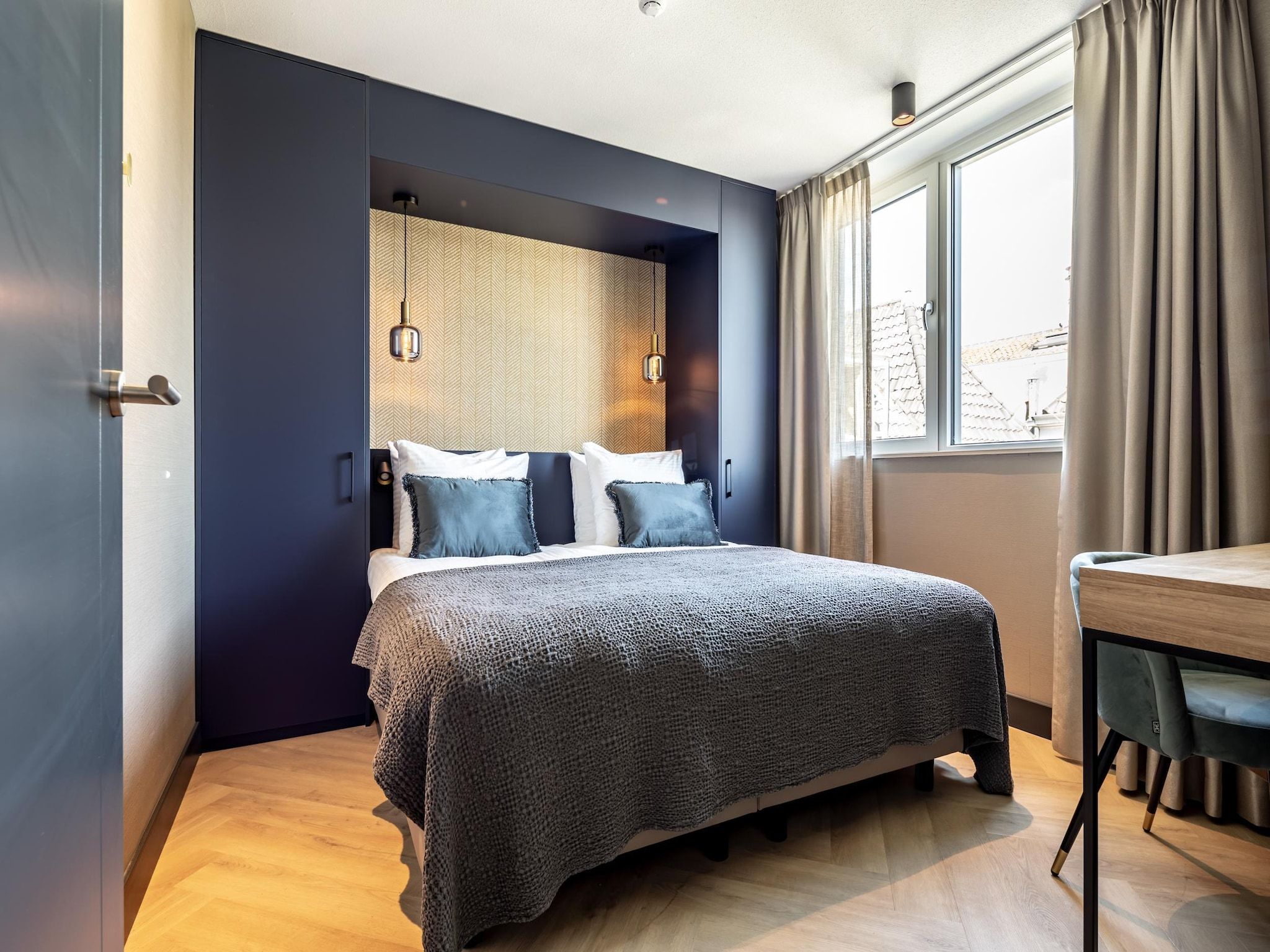 Een slaapkamer van Delft 5B in Delft