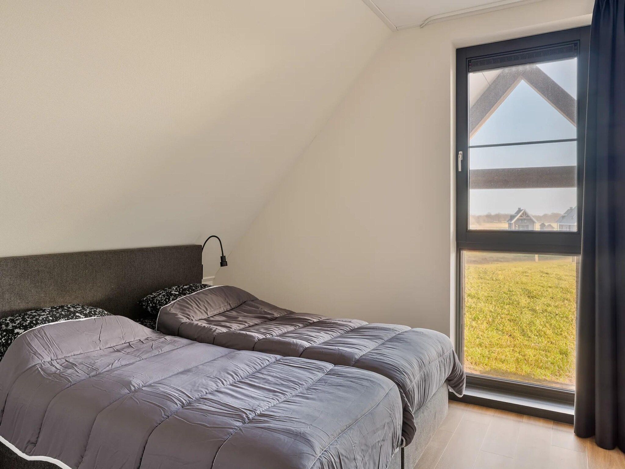 Een slaapkamer van Patrijs Wellness Plus 8 in Noardburgum
