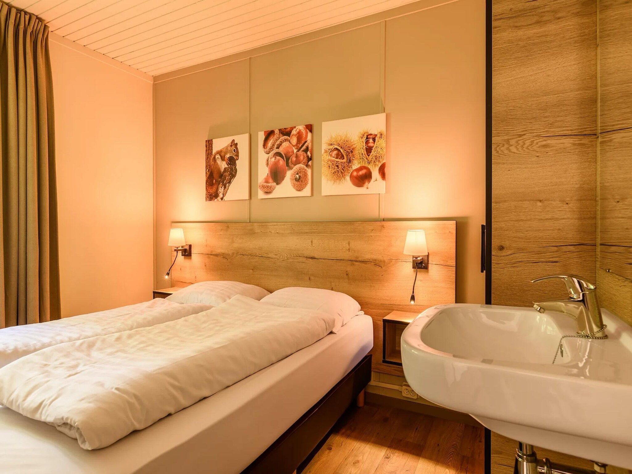 Een slaapkamer van Bungalow 6B1 in Putten