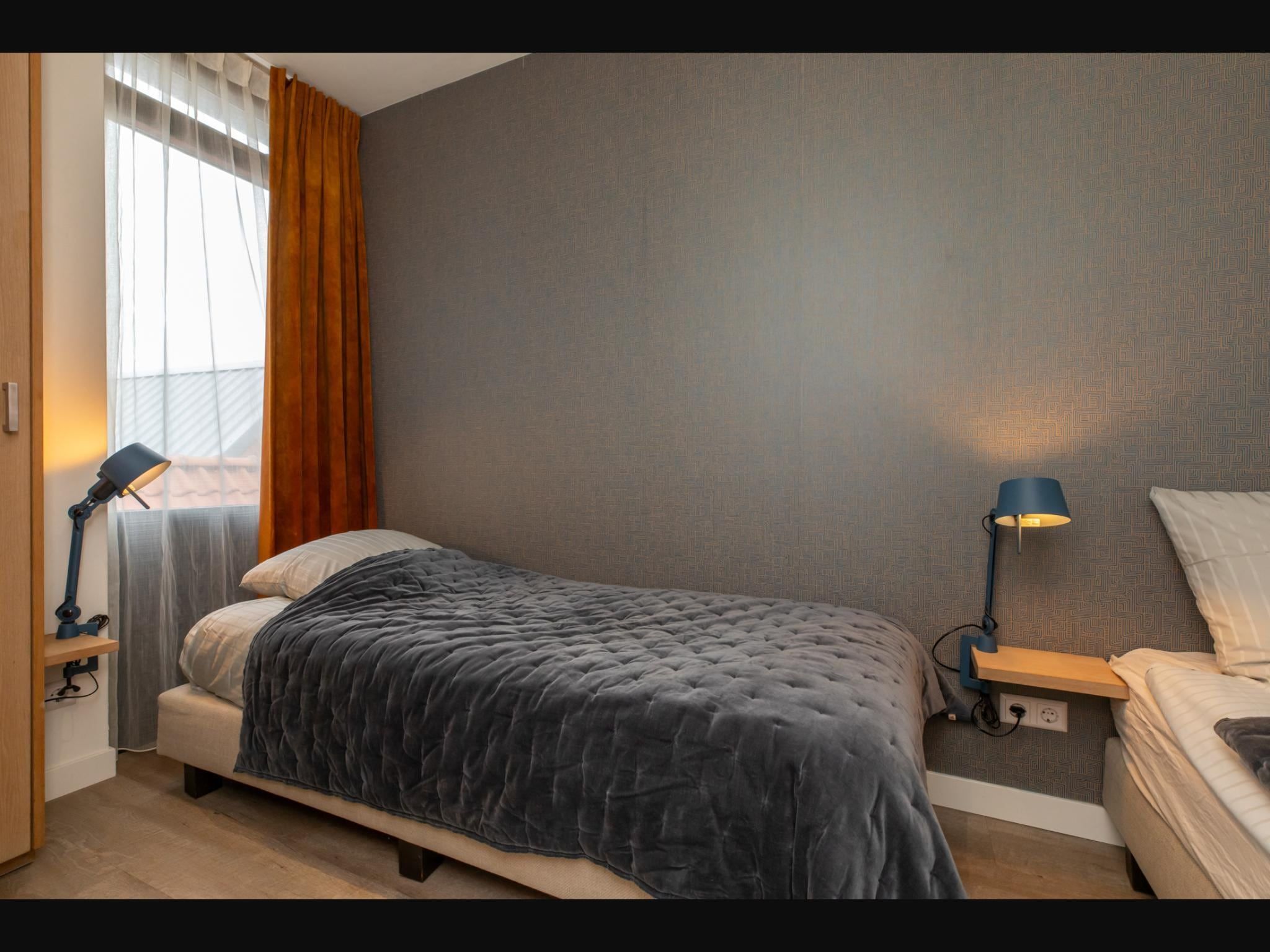 Een slaapkamer van Vakantiehuisje Langstraat 29A Zoutelande 4 Personen  Comfortabel Verblijf in Zoutelande