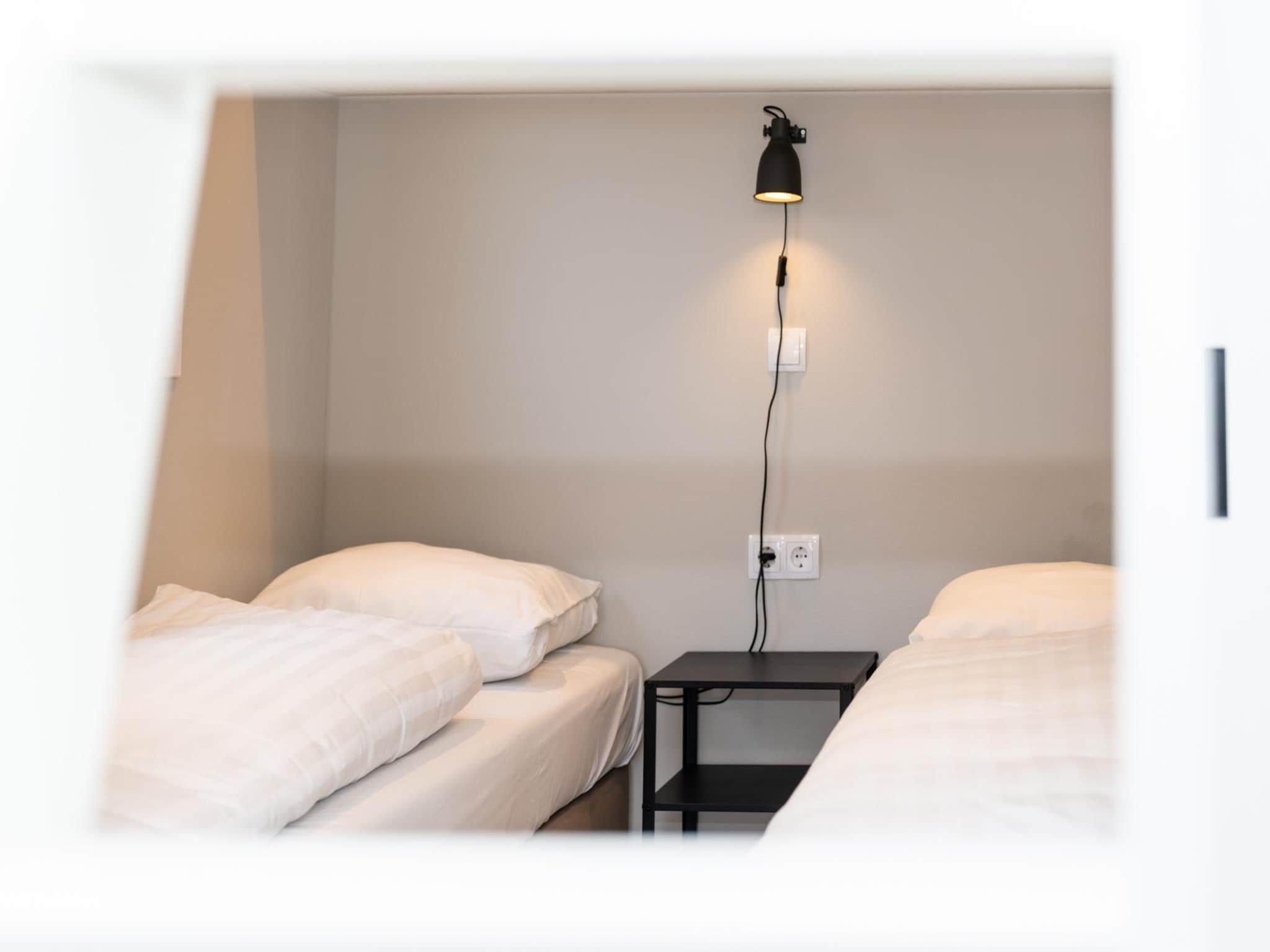 Een slaapkamer van Berg Lodge in Bemelen