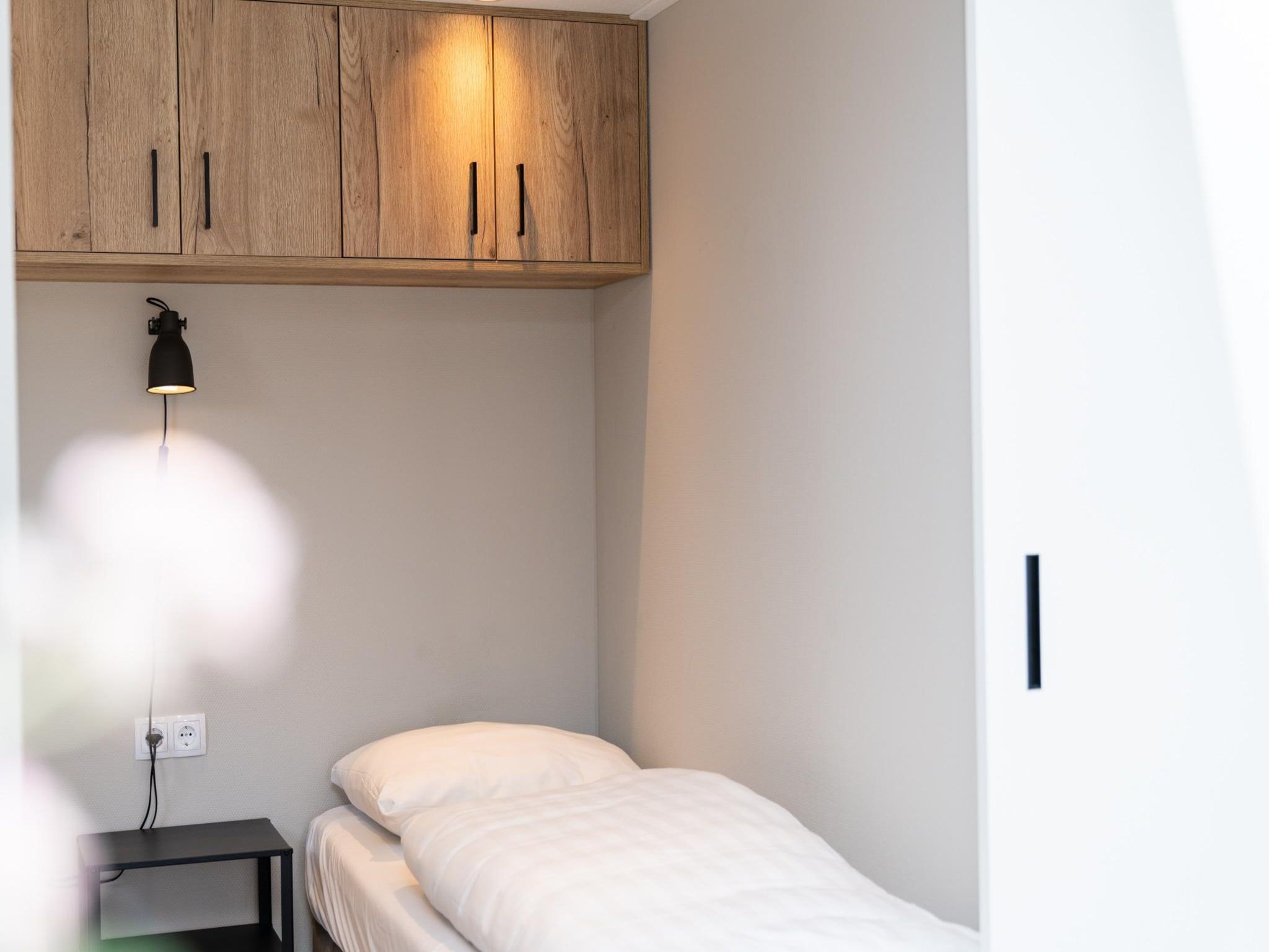 Een slaapkamer van Berg Lodge in Bemelen