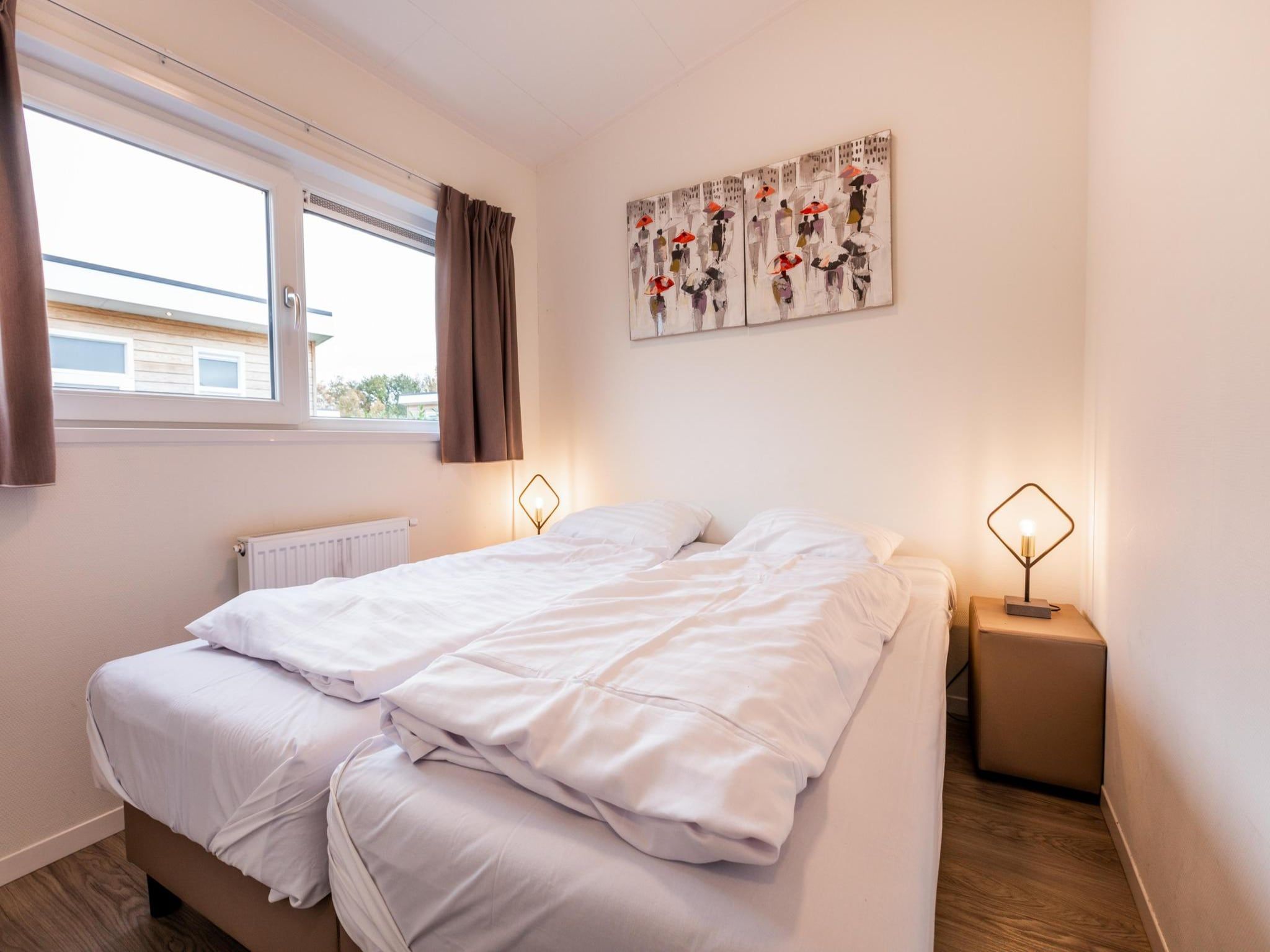 Een slaapkamer van Biebosch - Garden house in Bemelen