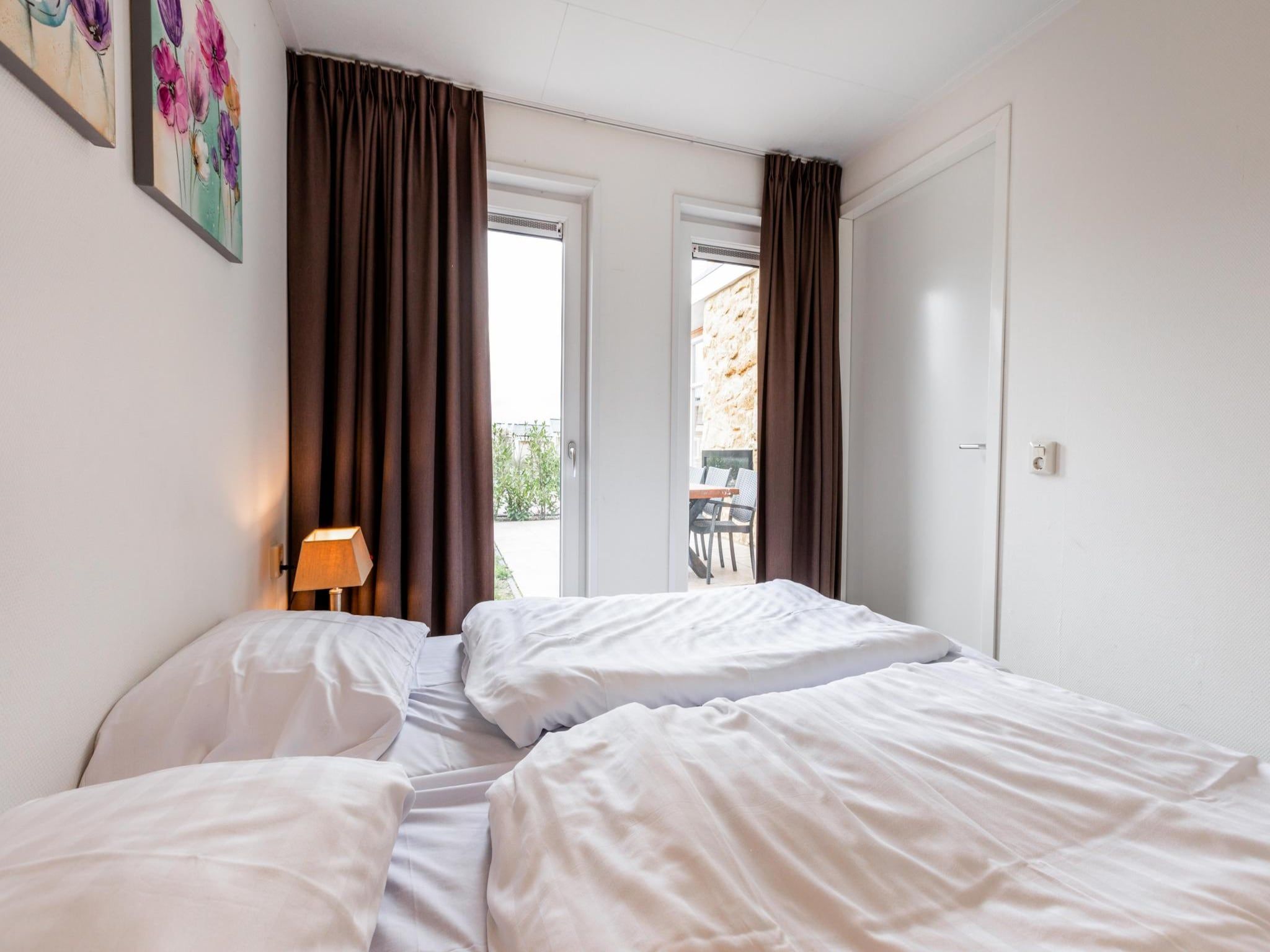 Een slaapkamer van Ravenbosch - Sauna in Bemelen