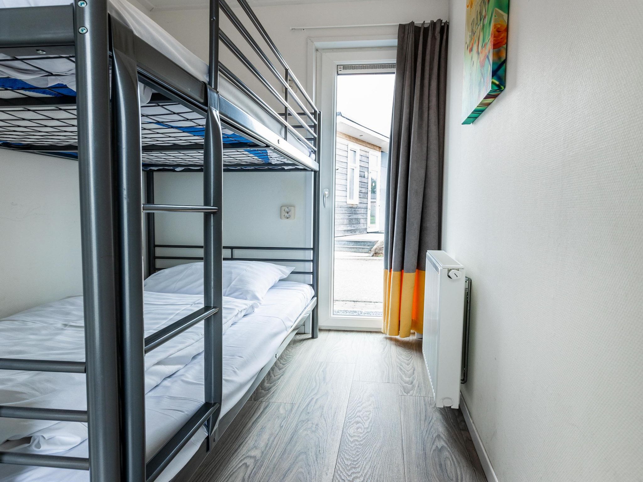 Een slaapkamer van Ravenbosch - Garden Shed in Bemelen