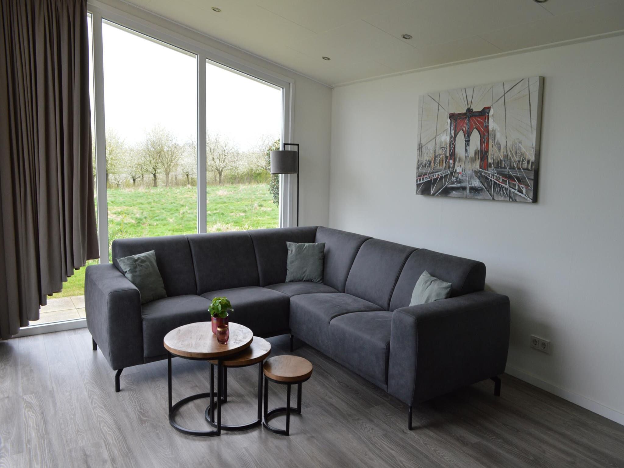 De woonkamer van Ravenbosch Royaal - Bath, Fireplace & Garden House in Bemelen