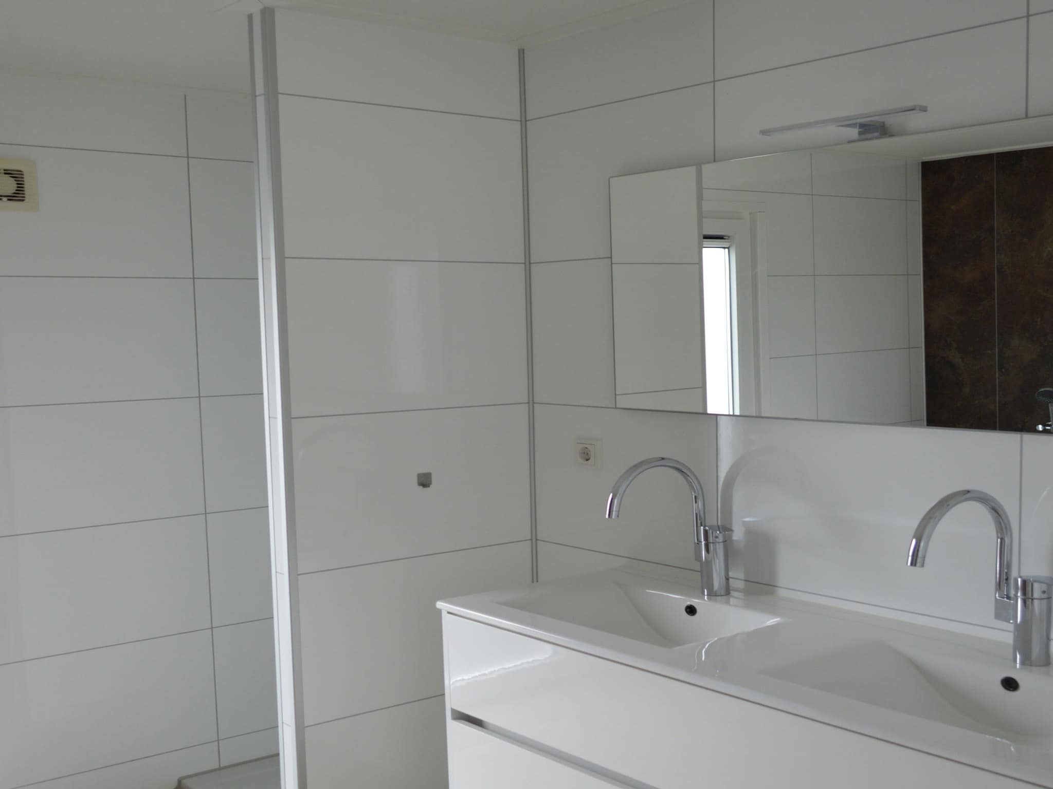 De badkamer van Ravenbosch Royal - Bath & Atmospheric fireplace in Bemelen