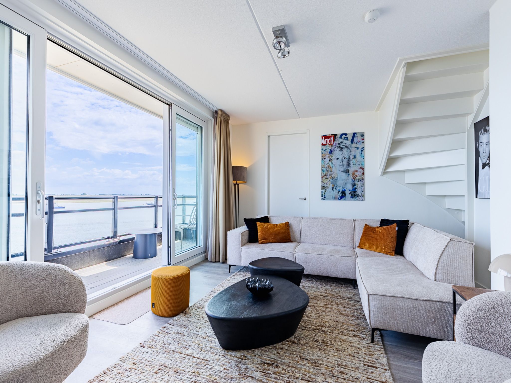 De woonkamer van Appartement Vista Maris 'Haus am See' - Havenweg 8-30  Sint-Annaland in Sint-Annaland