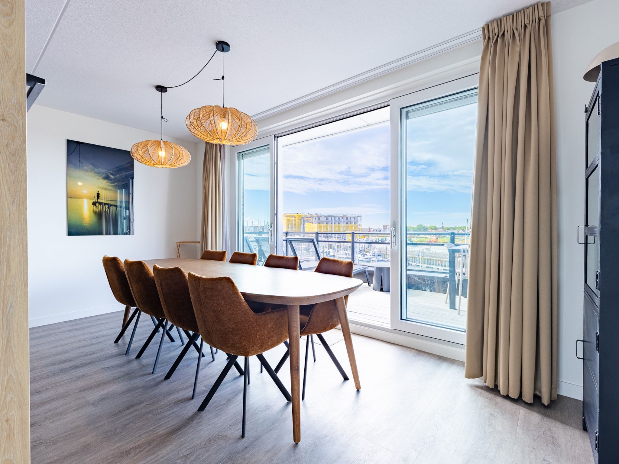 Het terras van Appartement Vista Maris 'Haus am See' - Havenweg 8-30  Sint-Annaland in Sint-Annaland