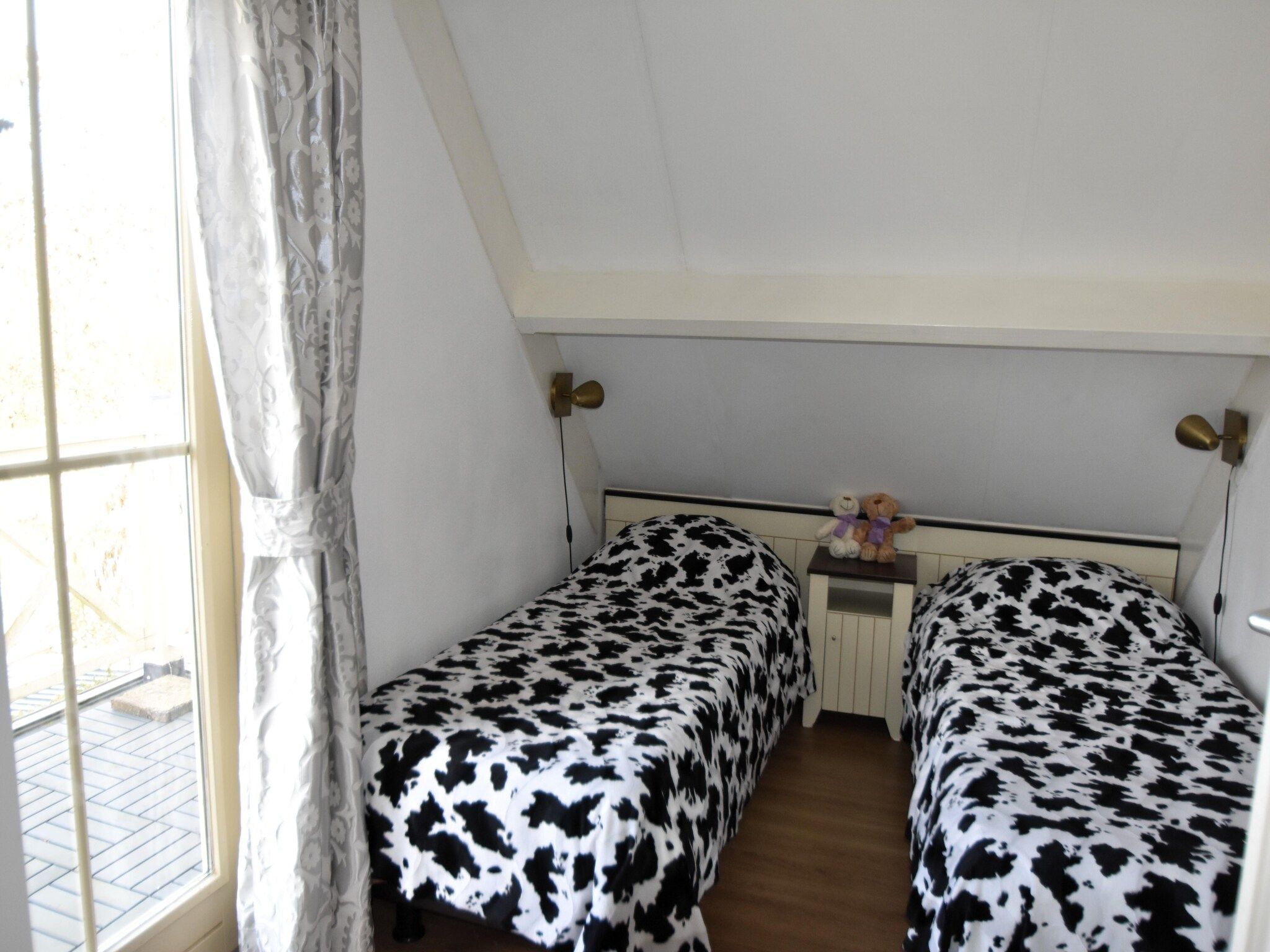 Een slaapkamer van Watervilla 51 in Simonshaven