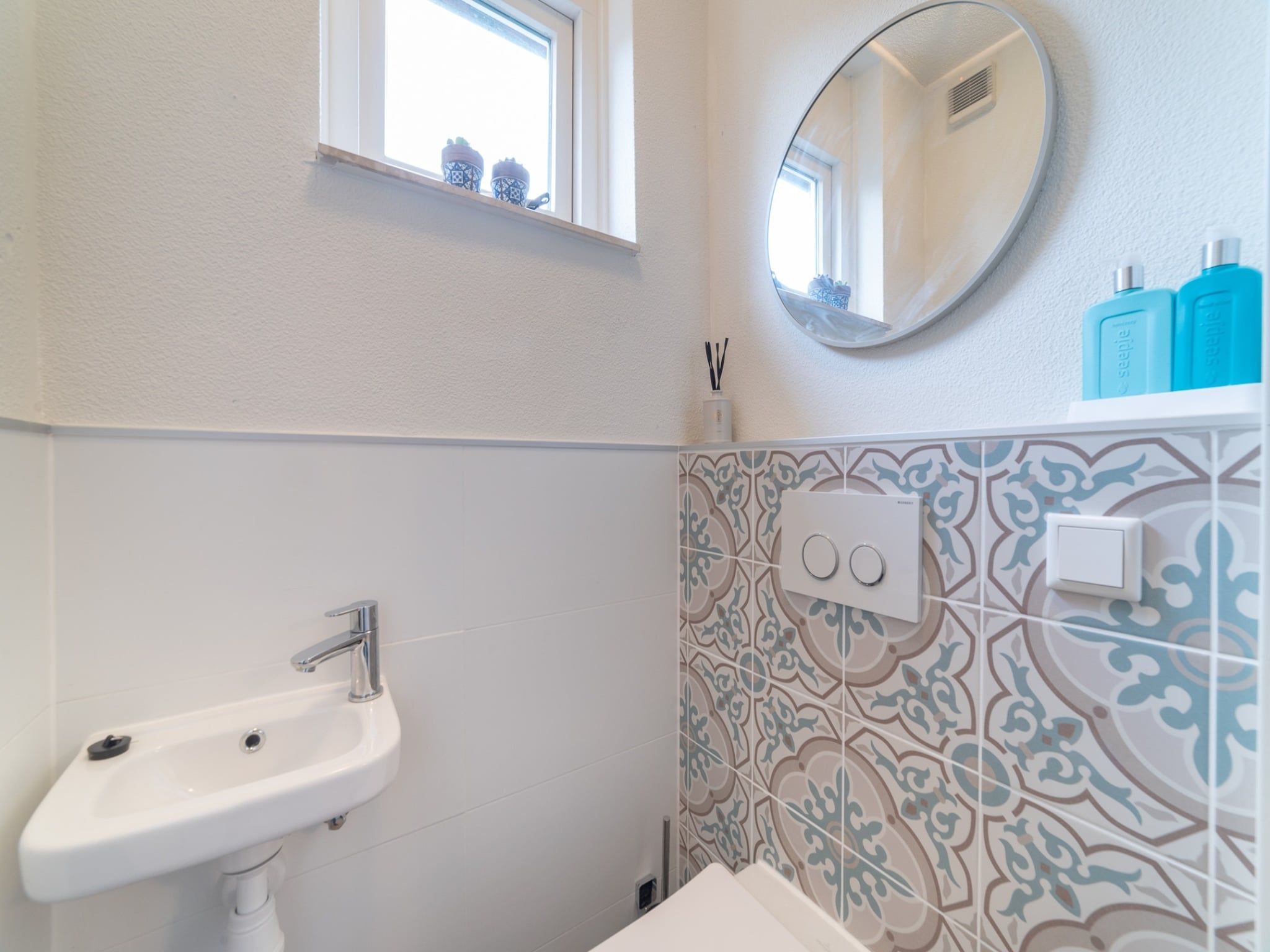 De badkamer van Villapark De Oesterbaai 63 in Wemeldinge