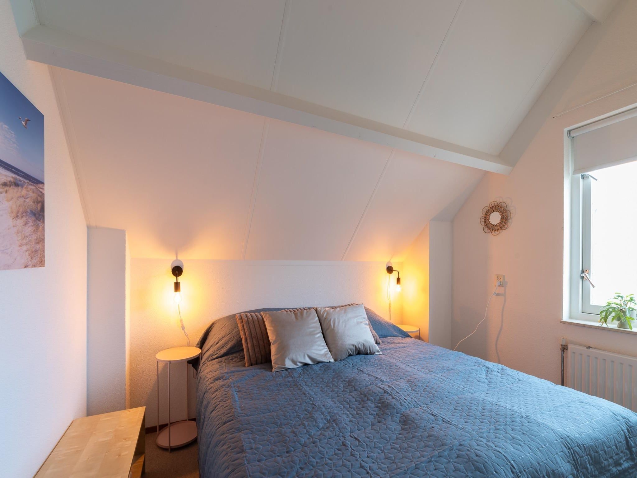 Een slaapkamer van Villapark De Oesterbaai 63 in Wemeldinge