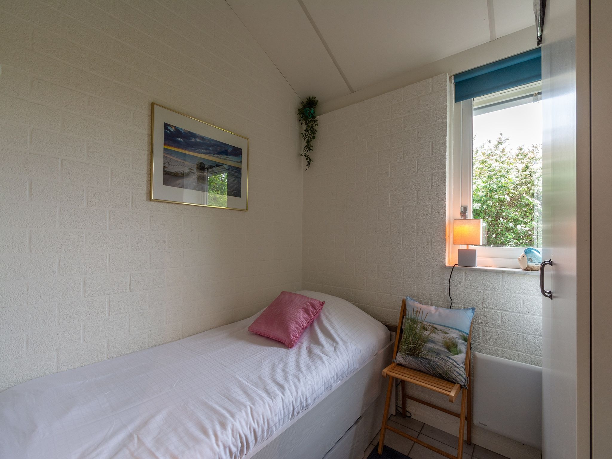 Een slaapkamer van Watersnip 9 in Petten