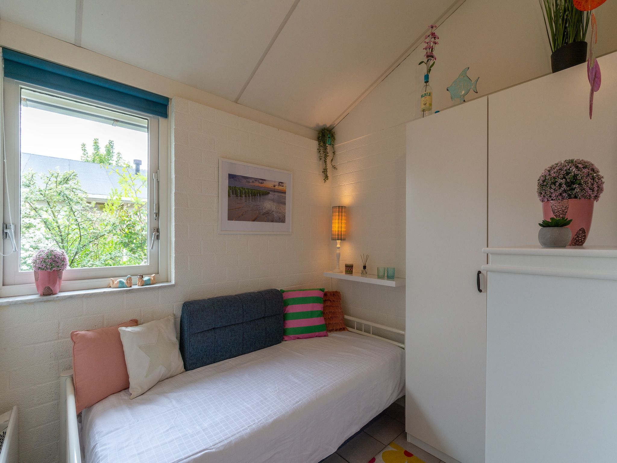 Een slaapkamer van Watersnip 9 in Petten