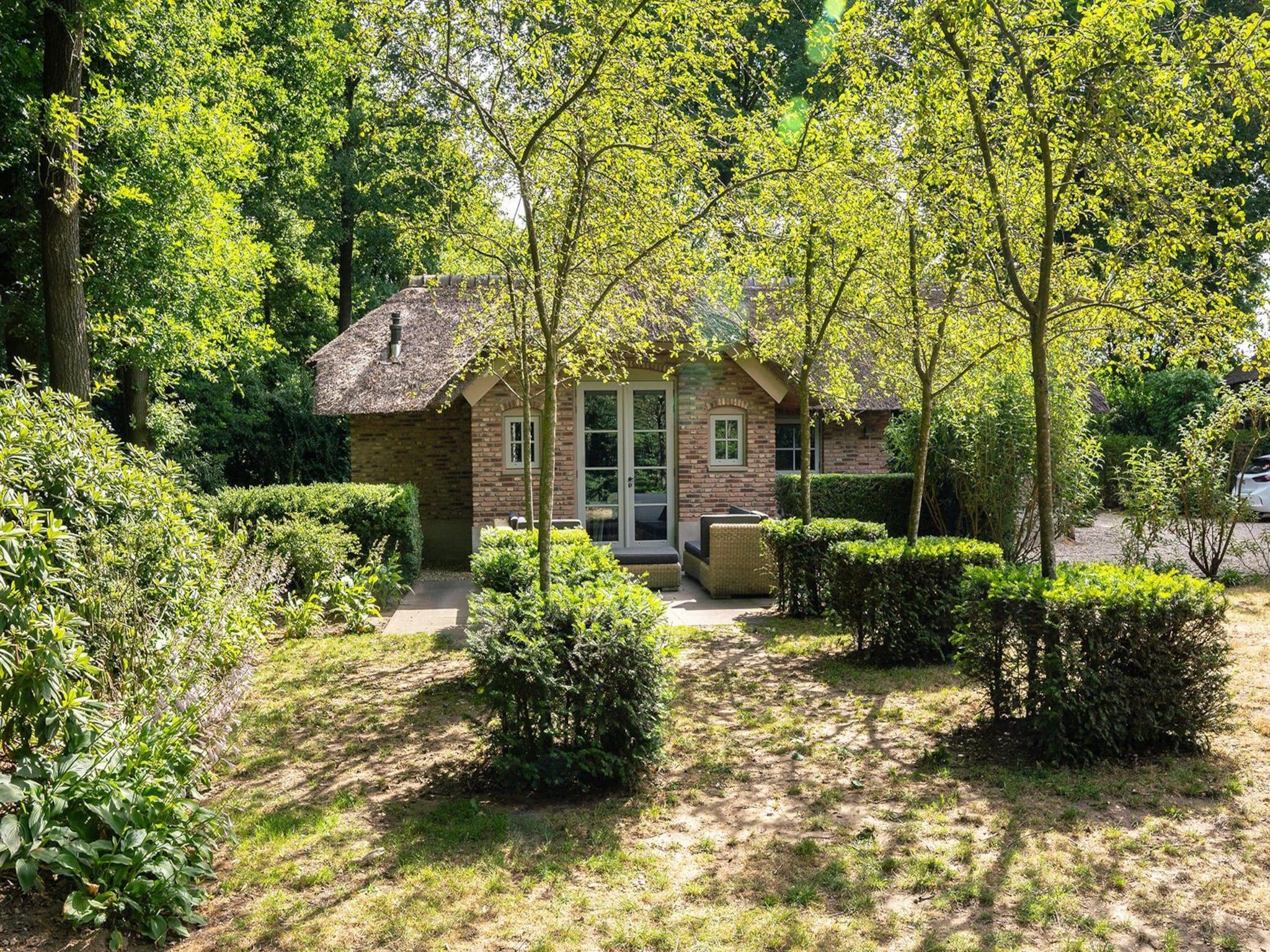 De buitenkant van Vlindervallei Villa 8p in Ermelo