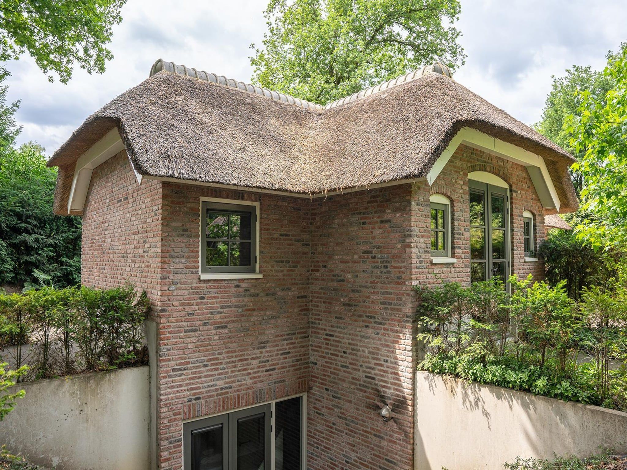 De buitenkant van Vlindervallei Villa 8p in Ermelo