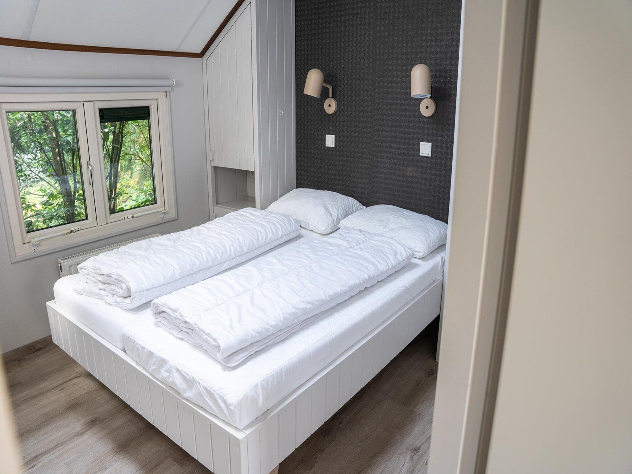 Een slaapkamer van Heivlinder 4p in Ermelo