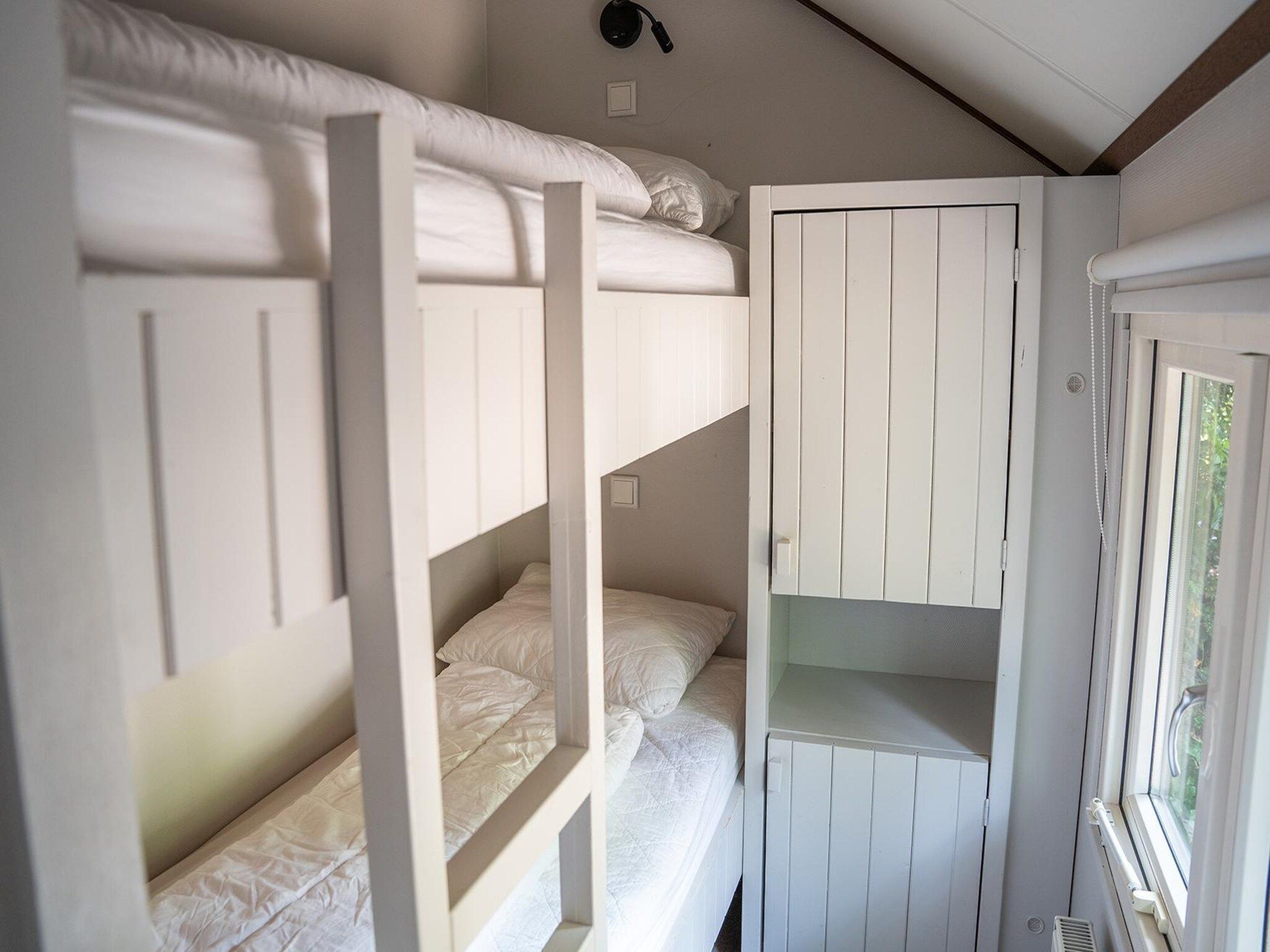 Een slaapkamer van Heivlinder 4p in Ermelo