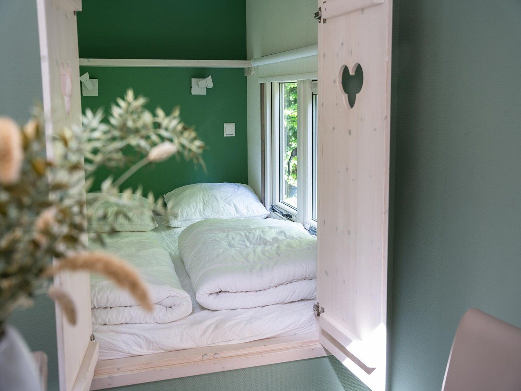 Een slaapkamer van Heivlinder 4+2p in Ermelo