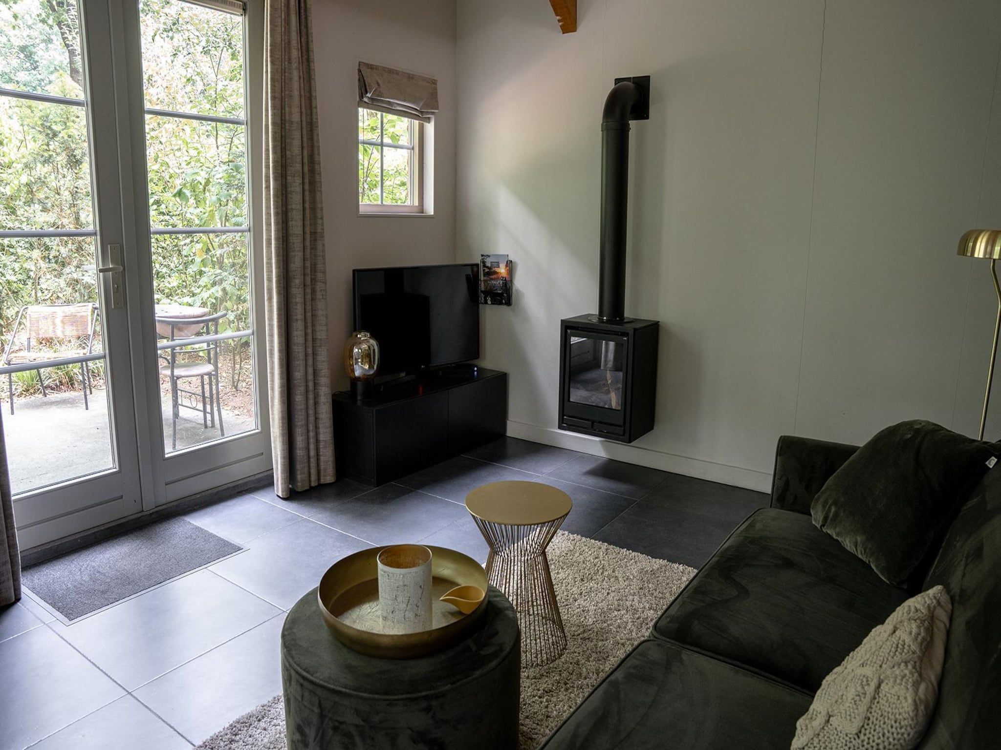 De woonkamer van Vlindervallei Studio 2p in Ermelo